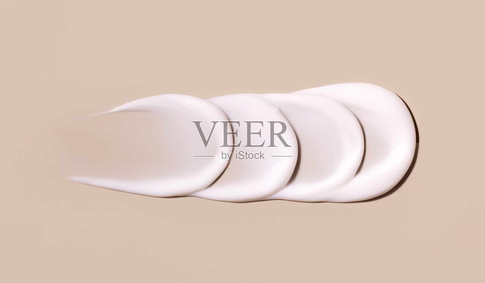 化妆品涂抹霜质地在柔和的背景照片摄影图片