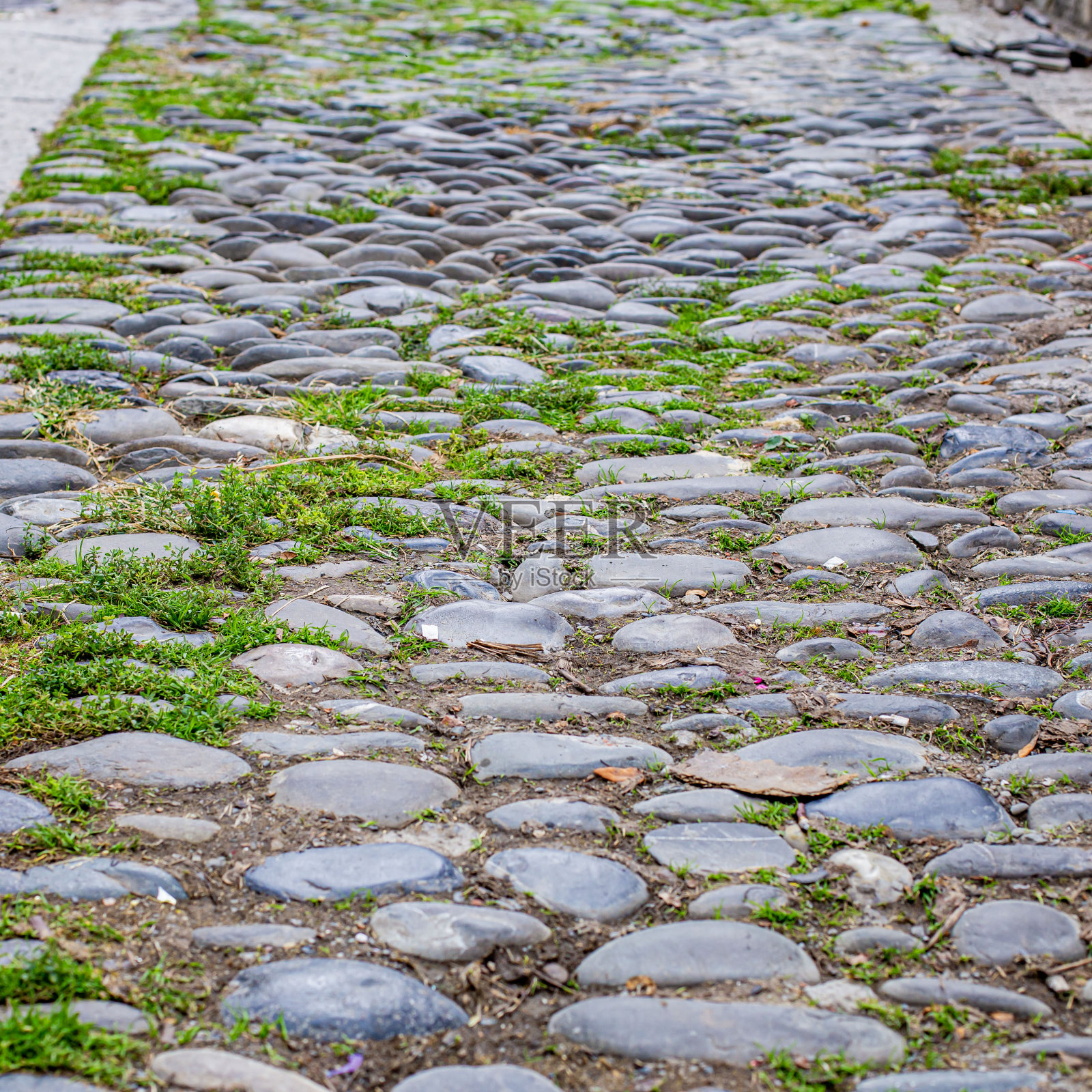 在老城的古街上用石头铺成的马路照片摄影图片