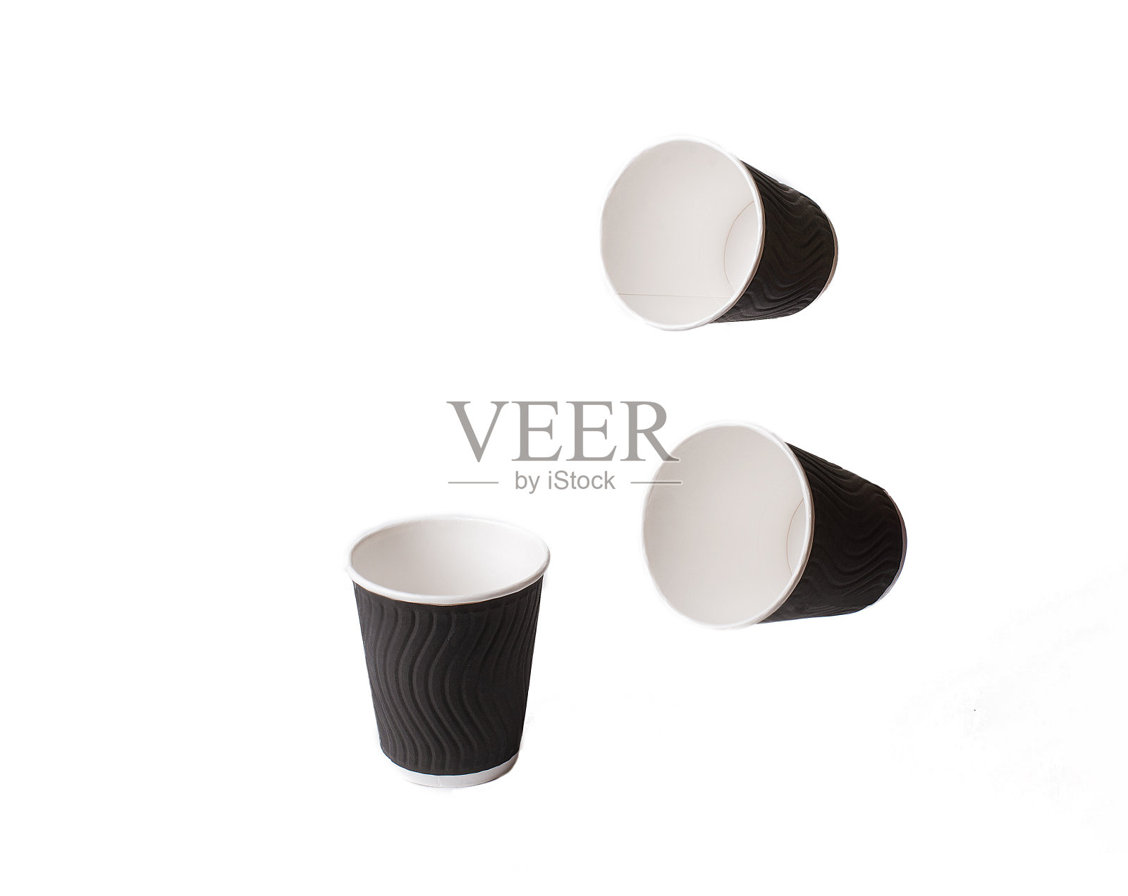 四个纸杯放在一个托盘上照片摄影图片