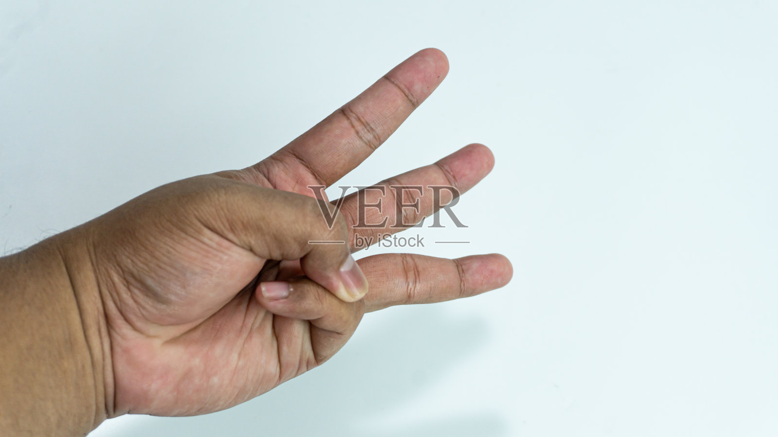 有三个手指的手在白色背景上孤立地摆姿势照片摄影图片