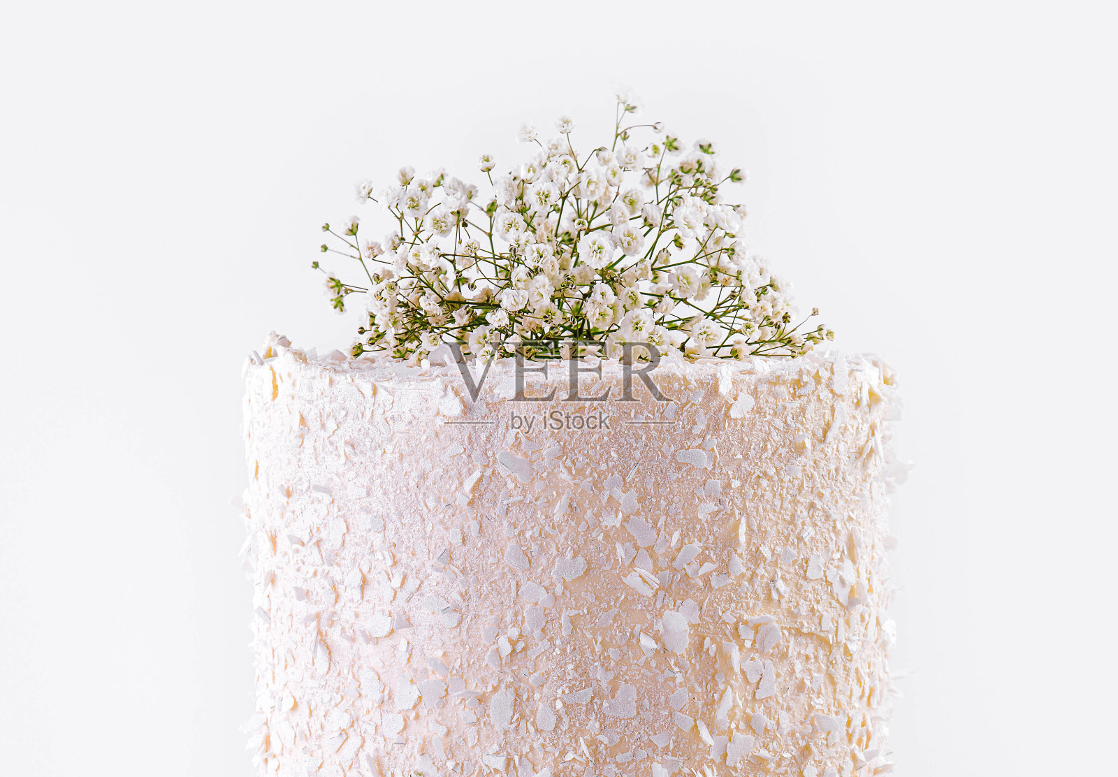 美丽的多层婚礼蛋糕和鲜花照片摄影图片