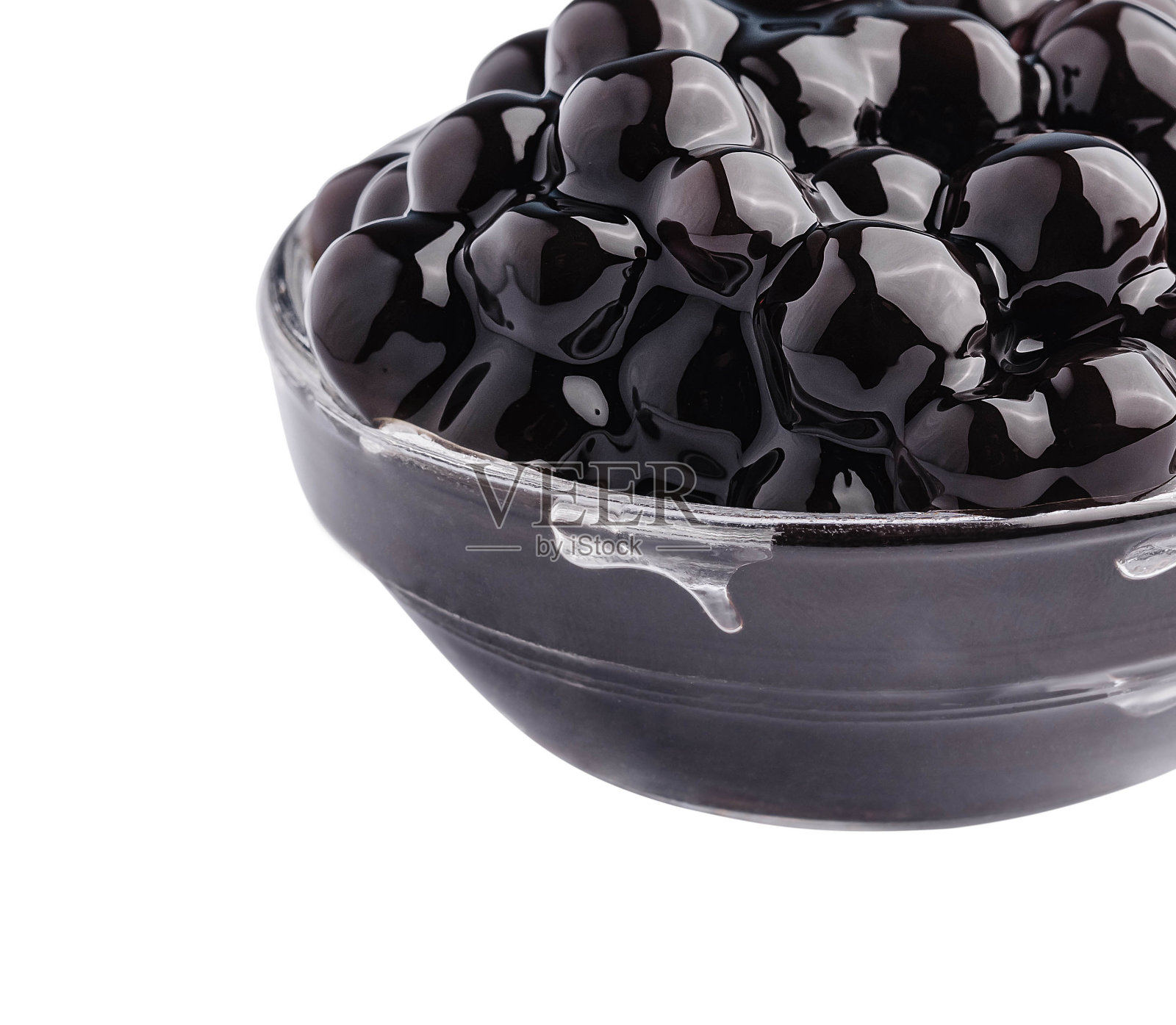 黑珍珠茶在玻璃隔离照片摄影图片