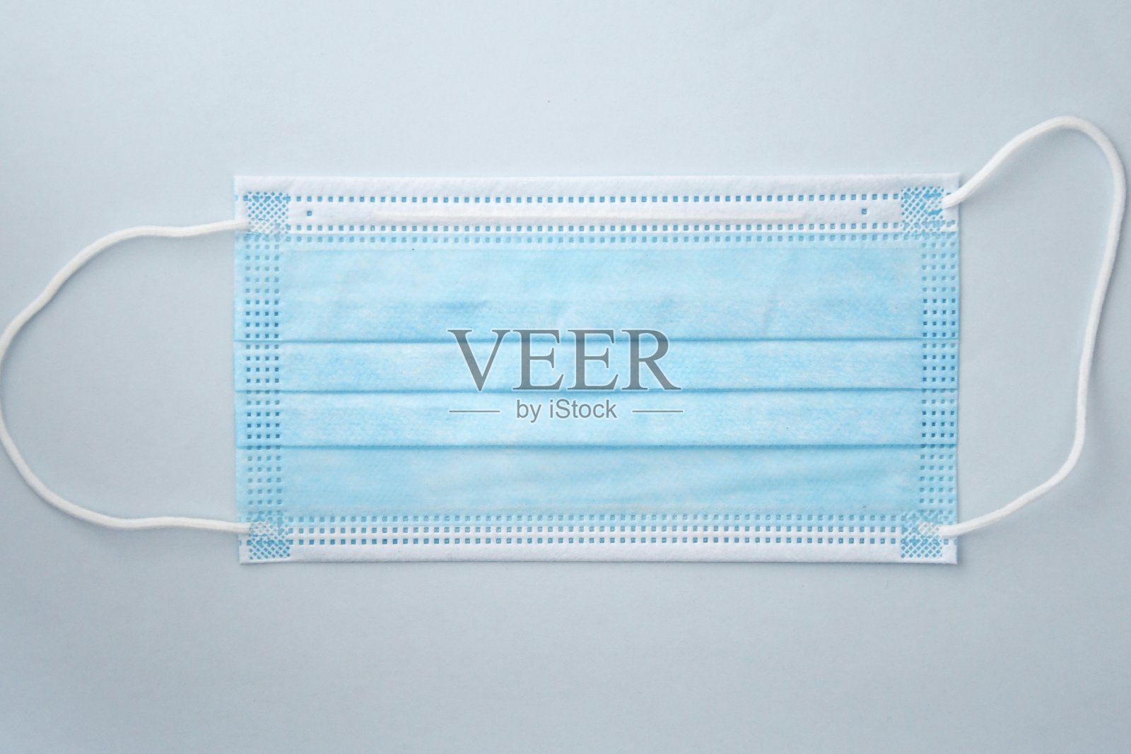 一张蓝色口罩的照片照片摄影图片