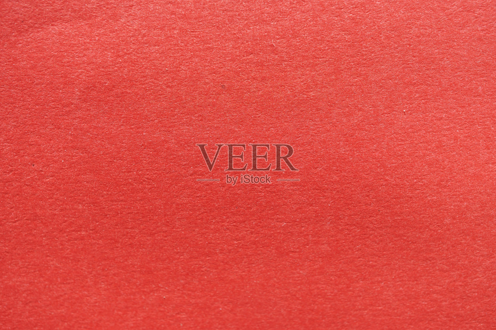 明亮的红色纹理纸的特写视图，完美的背景或平面设计项目。照片摄影图片