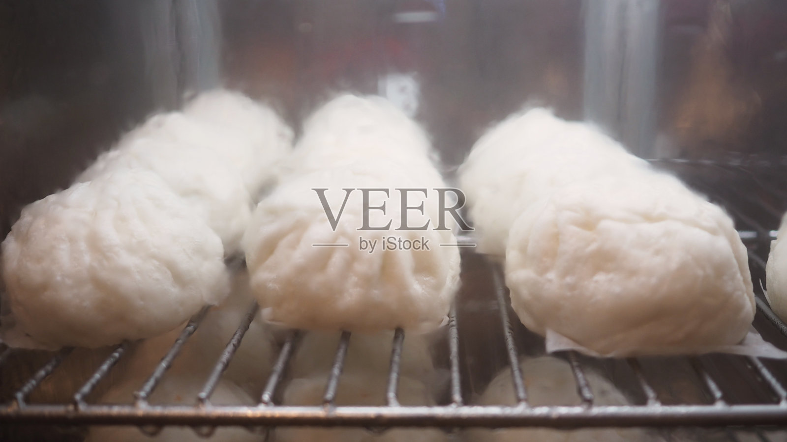 馒头或蒸饺。照片摄影图片