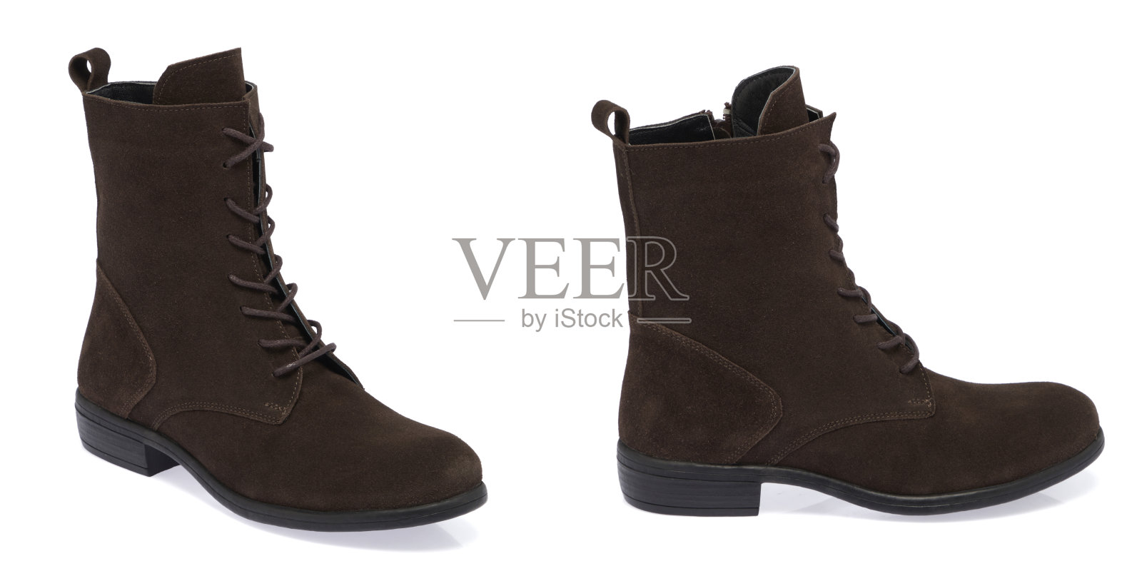 棕色麂皮靴在白色的背景照片摄影图片