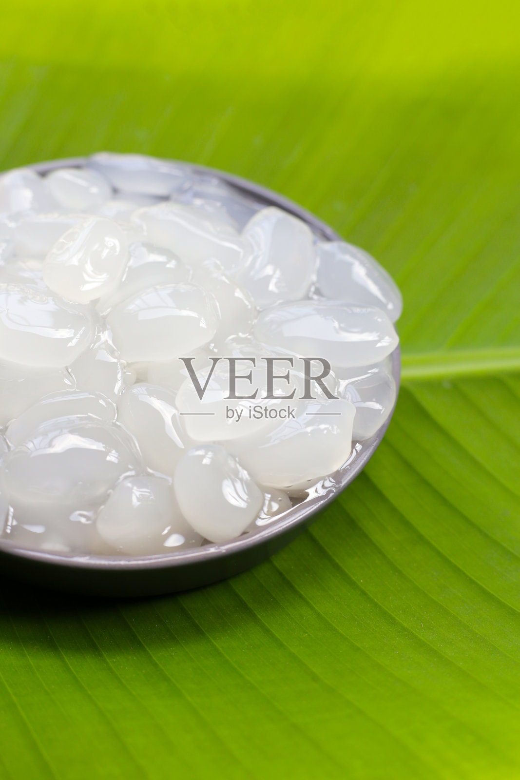 糖棕榈籽在糖浆照片摄影图片