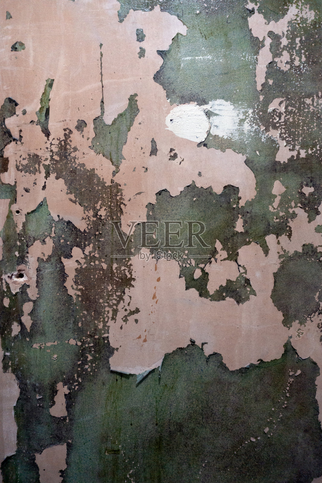 工业墙漆面腐烂，锈迹剥落照片摄影图片