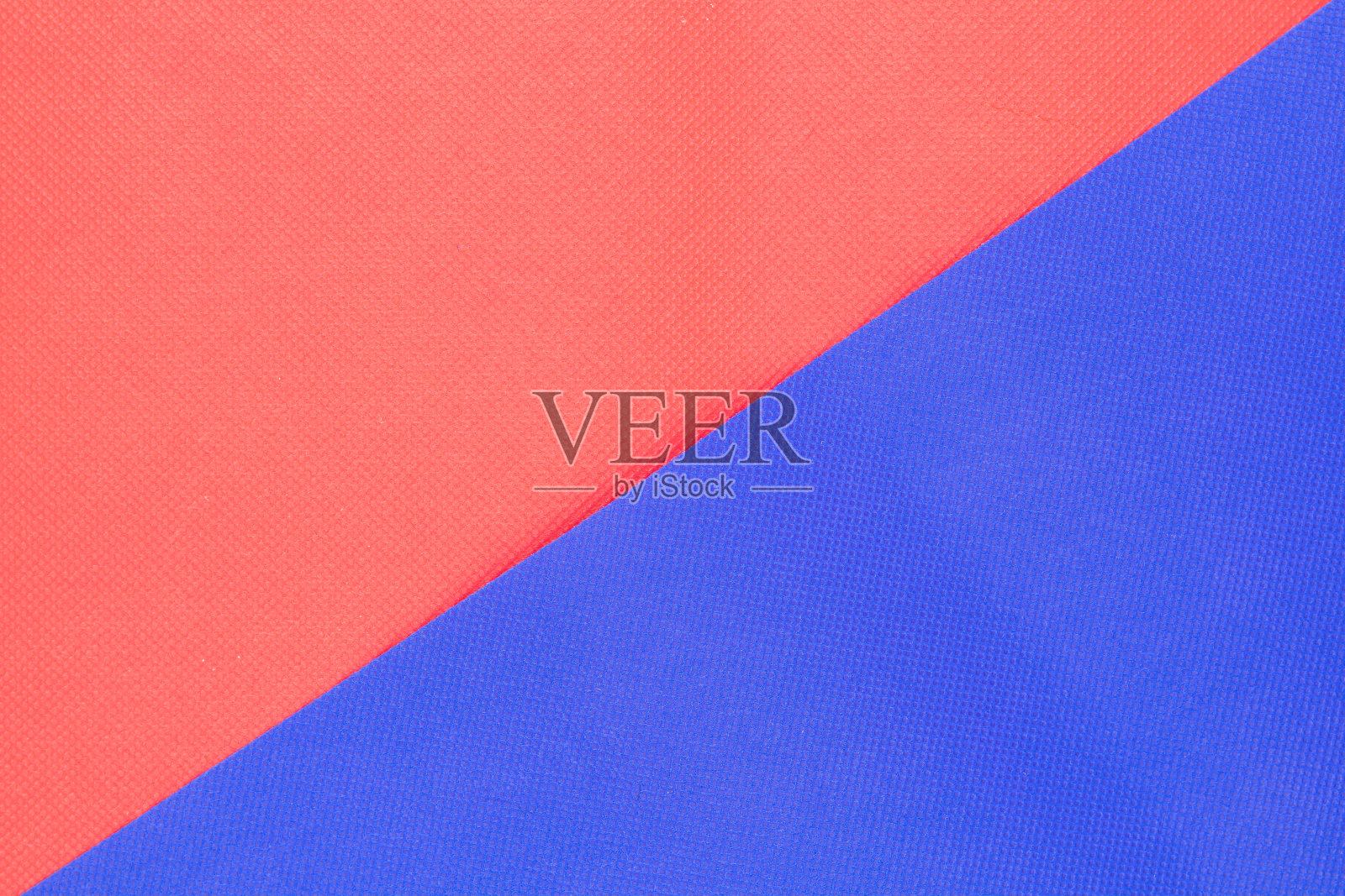 红色和蓝色的背景纹理，特写细节的彩色织物纹理，背景和纹理的设计与复制空间。照片摄影图片