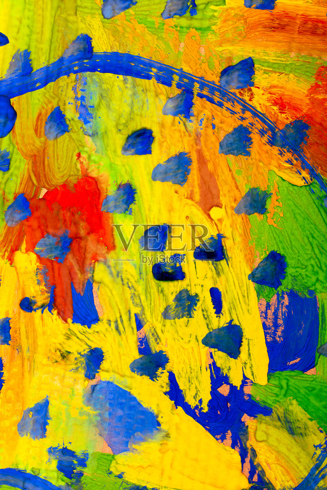 蓝色，黄色和红色的颜料在纸上。摘要。照片摄影图片