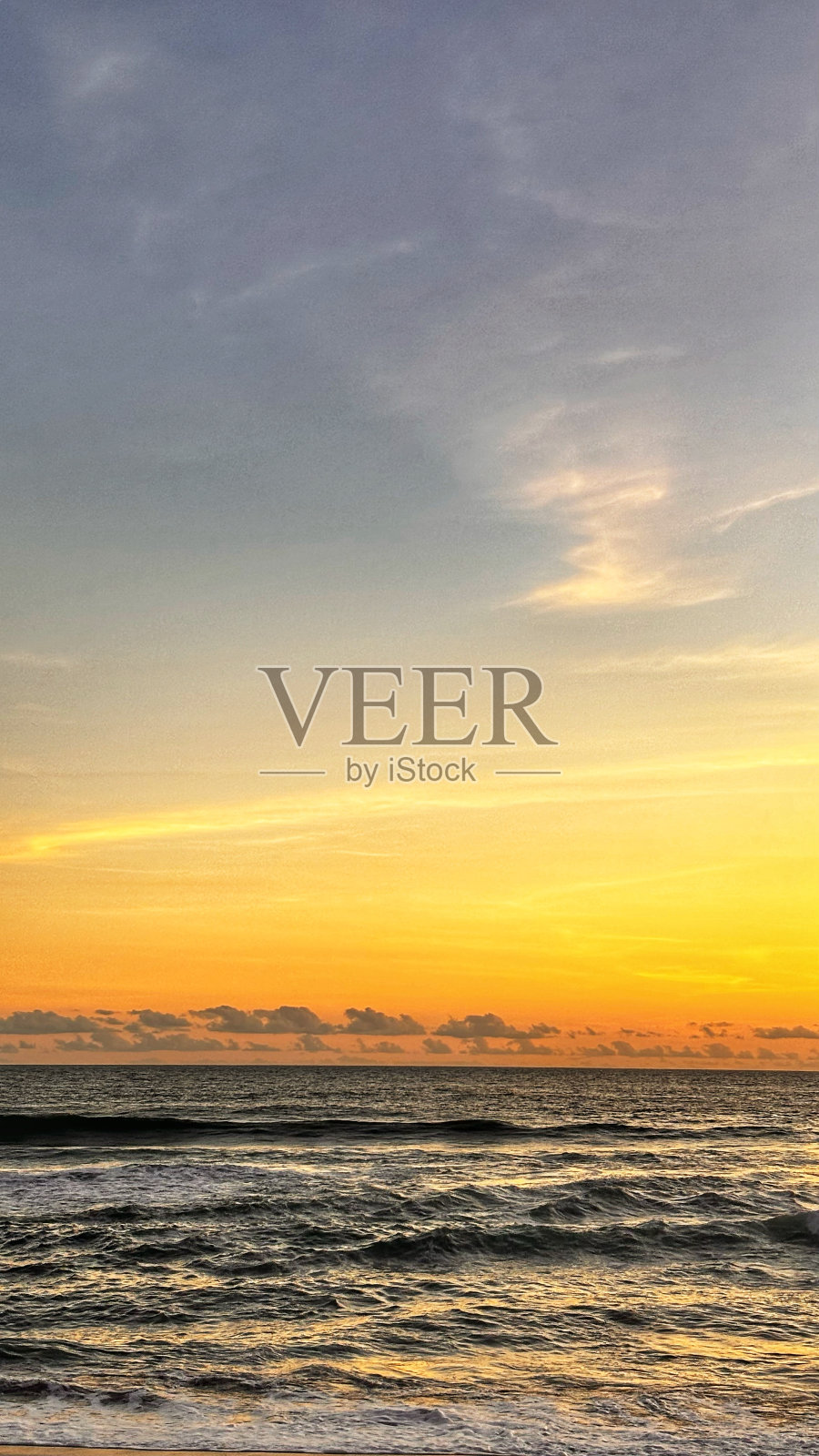 橙色的天空和海滩照片摄影图片