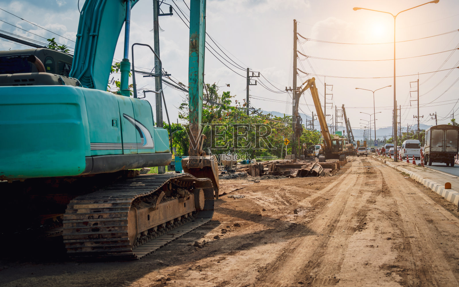 大型道路施工现场，施工区域有专用机械照片摄影图片