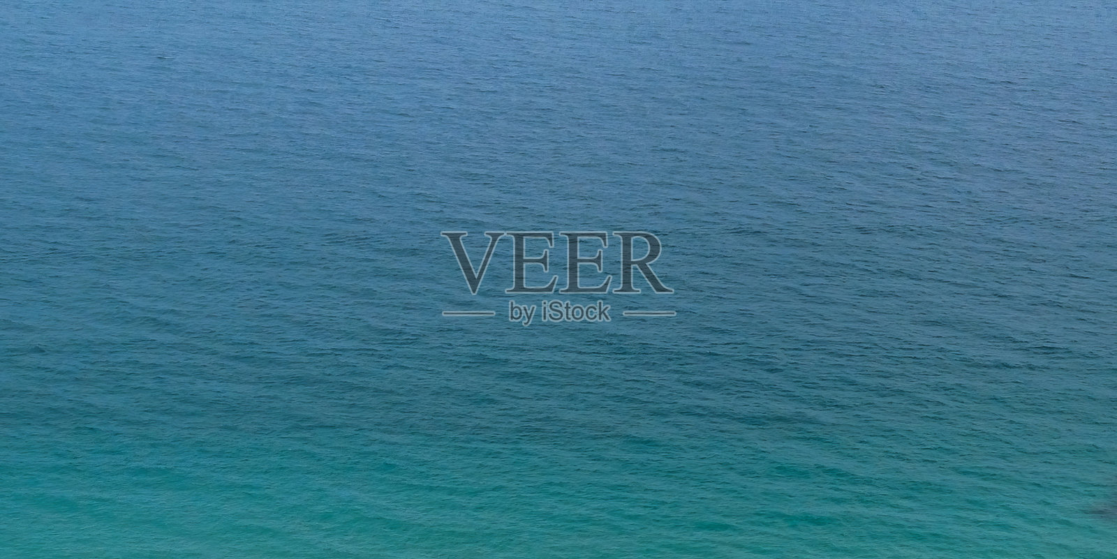 抽象蓝色的海洋表面背景纹理与夏天。背景照片摄影图片