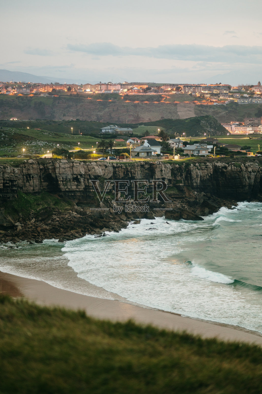 有悬崖的海滩照片摄影图片