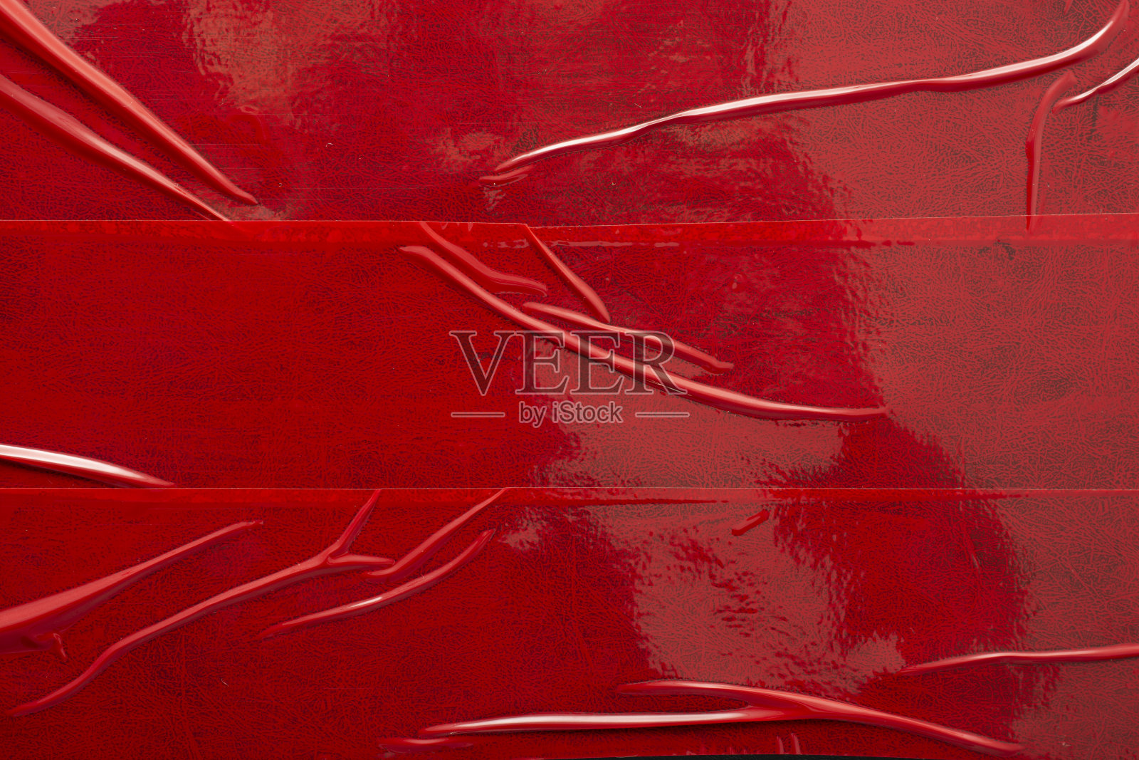 抽象背景的红色磁带与折叠。照片摄影图片