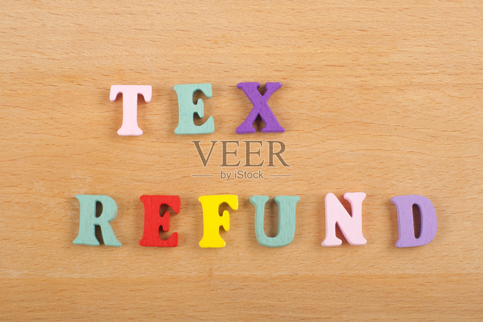 TEX退款字木制背景组成的彩色abc字母表块木字母，复制空间的广告文字。学习英语的理念。照片摄影图片