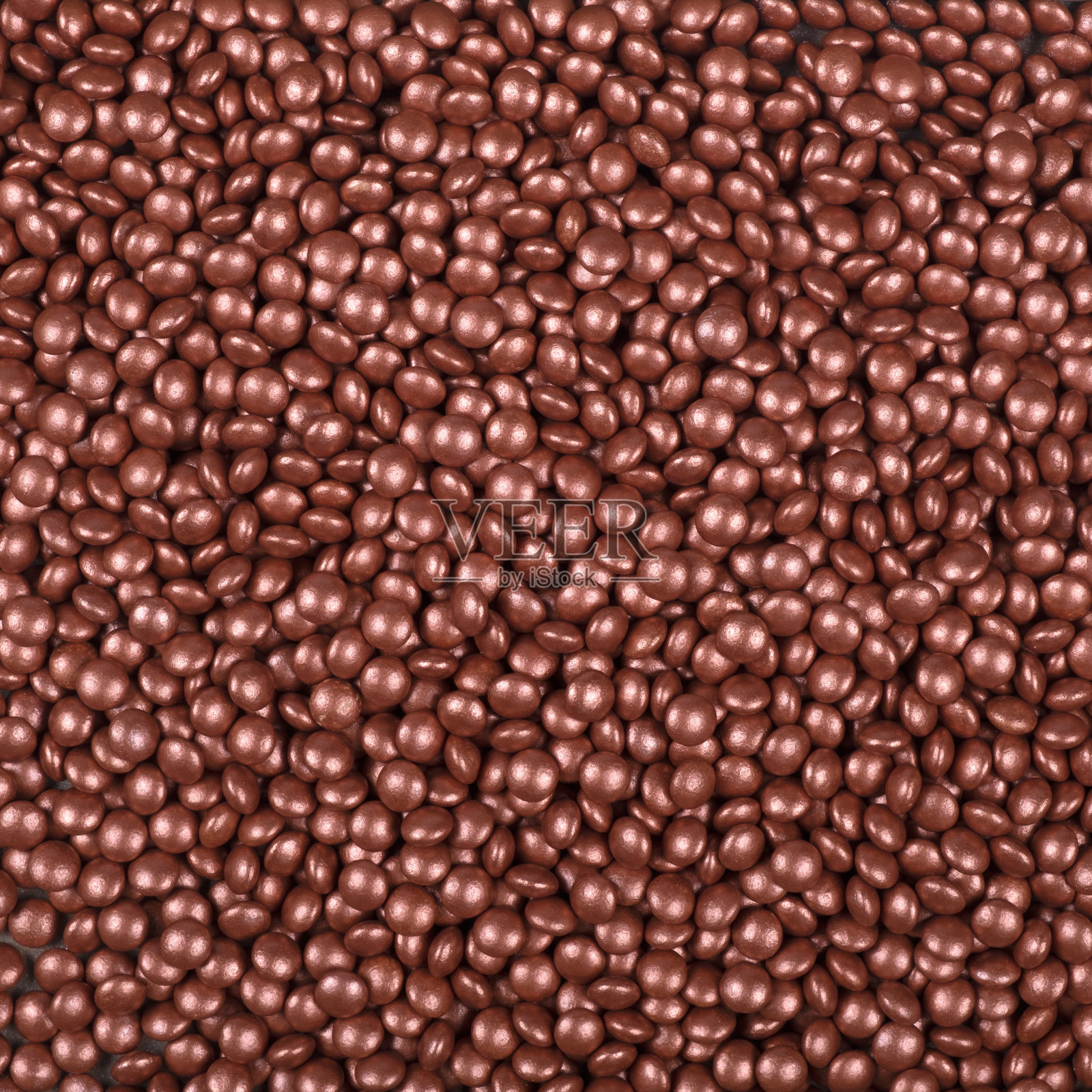 色彩鲜艳的蛋糕装饰，粉状和粒状。照片摄影图片