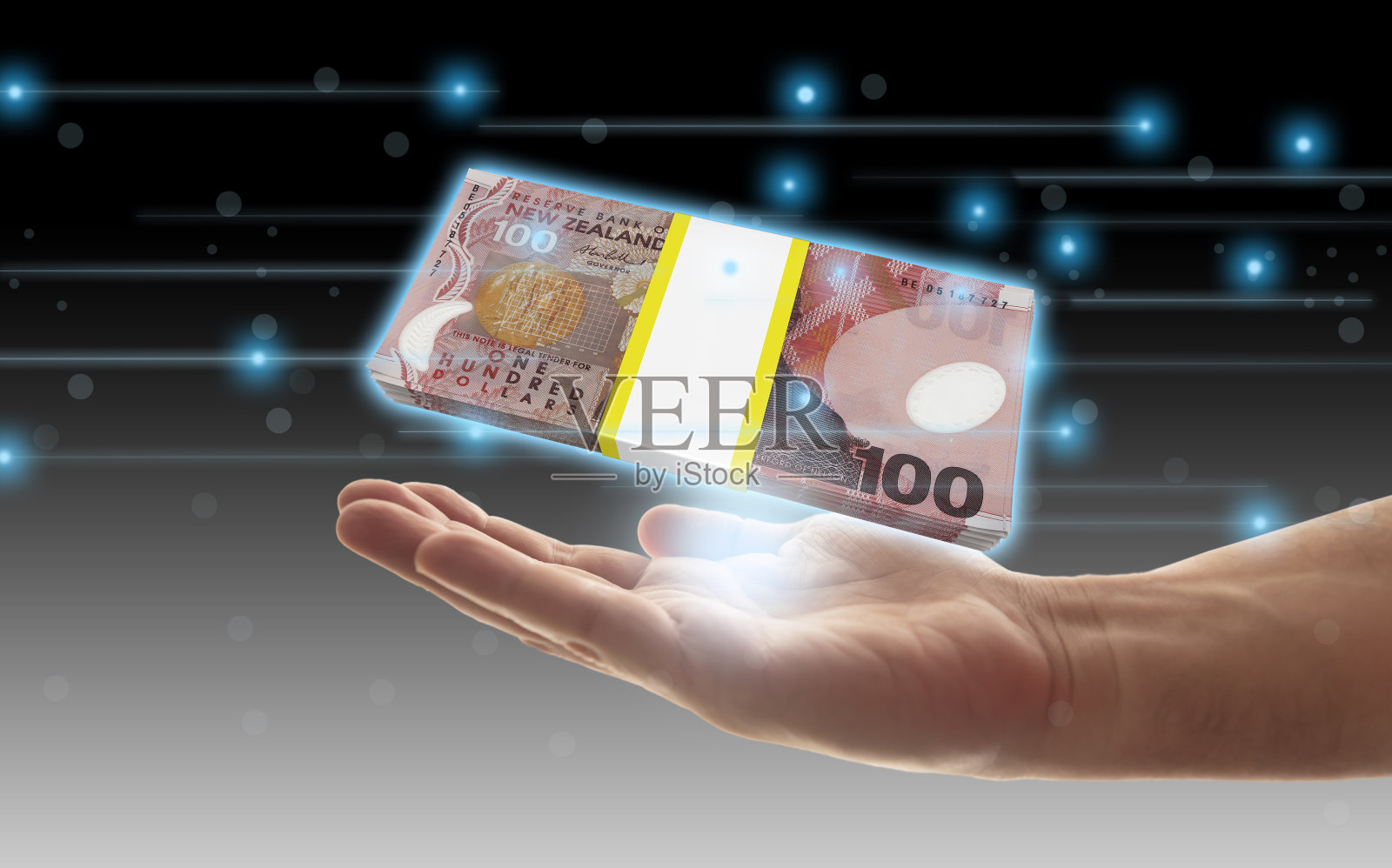 金融科技，金融科技概念，用数字数据制作的新西兰元钞票照片摄影图片