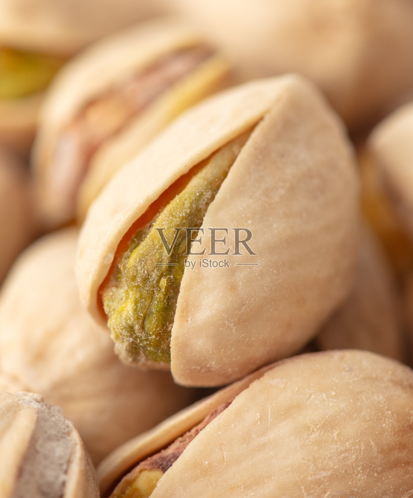 新鲜的开心果作为背景。宏照片摄影图片