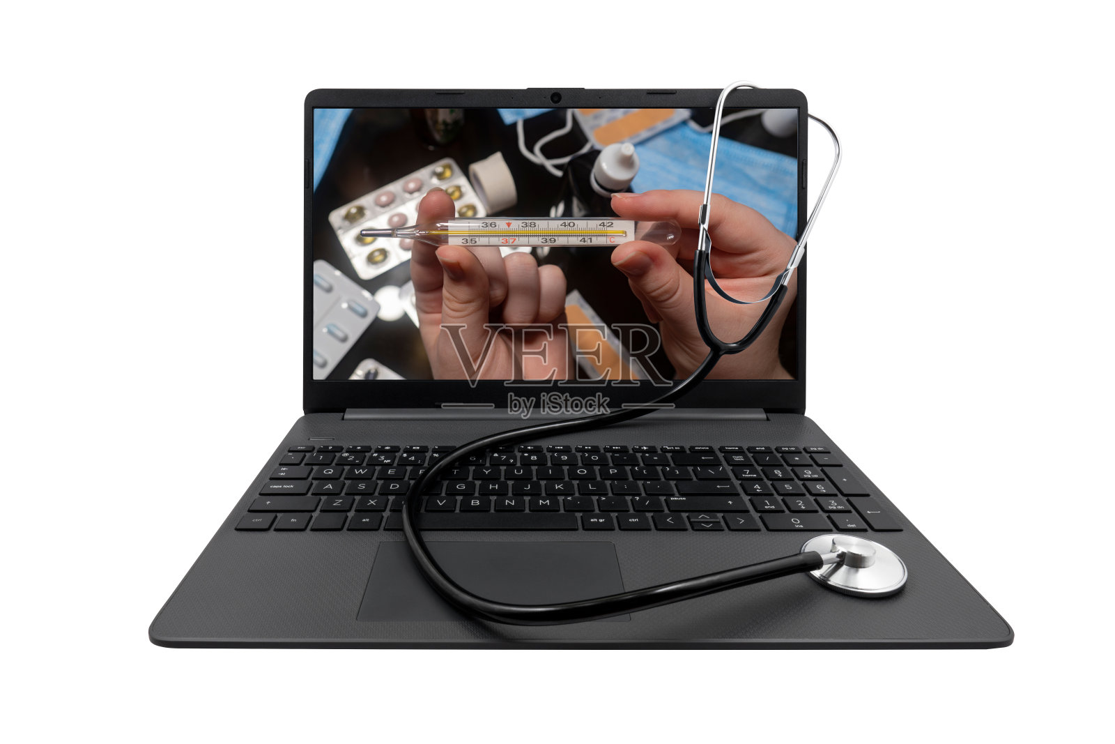 笔记本电脑和医用听诊器被隔离在白色背景上照片摄影图片