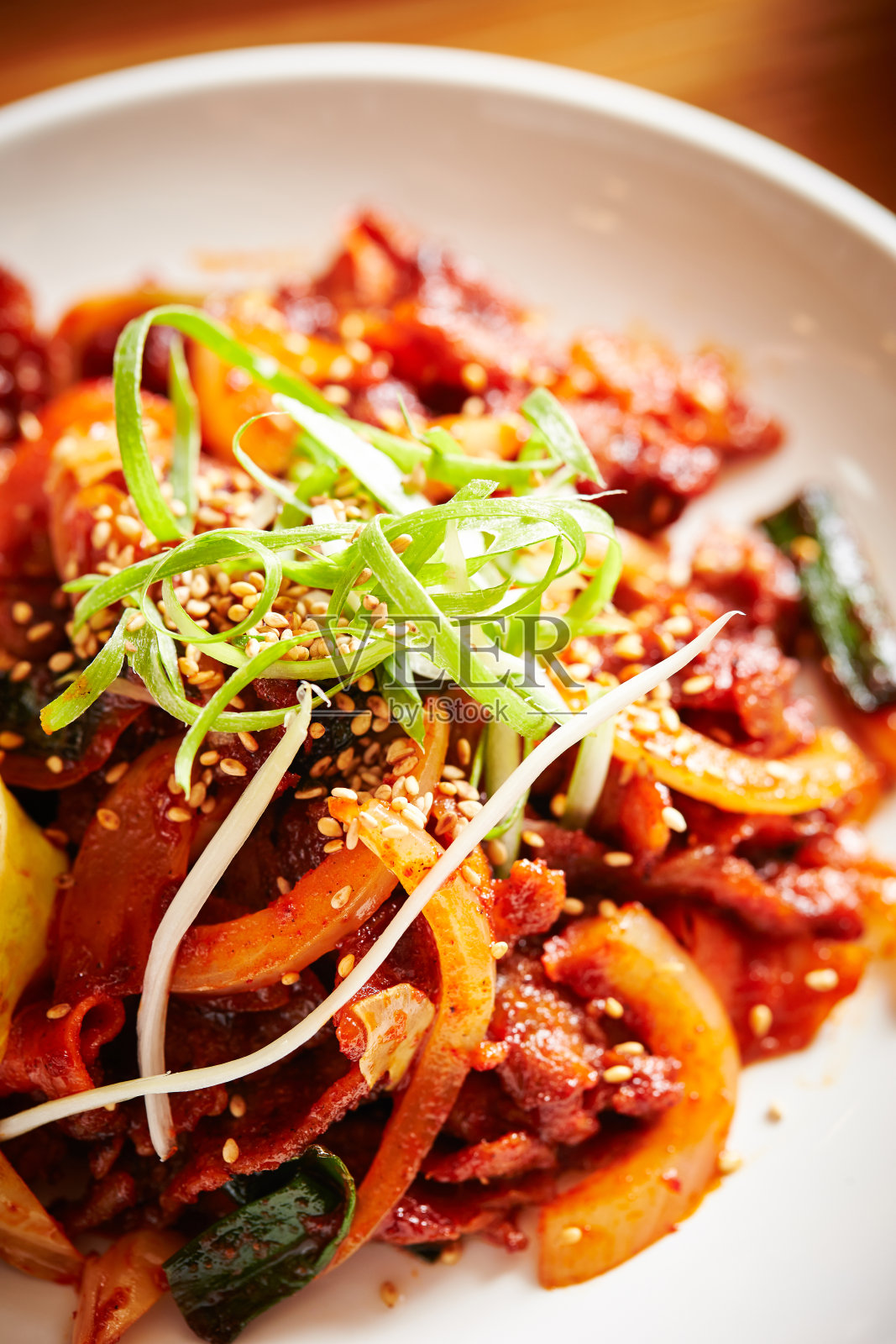 韩式麻辣炒肉照片摄影图片