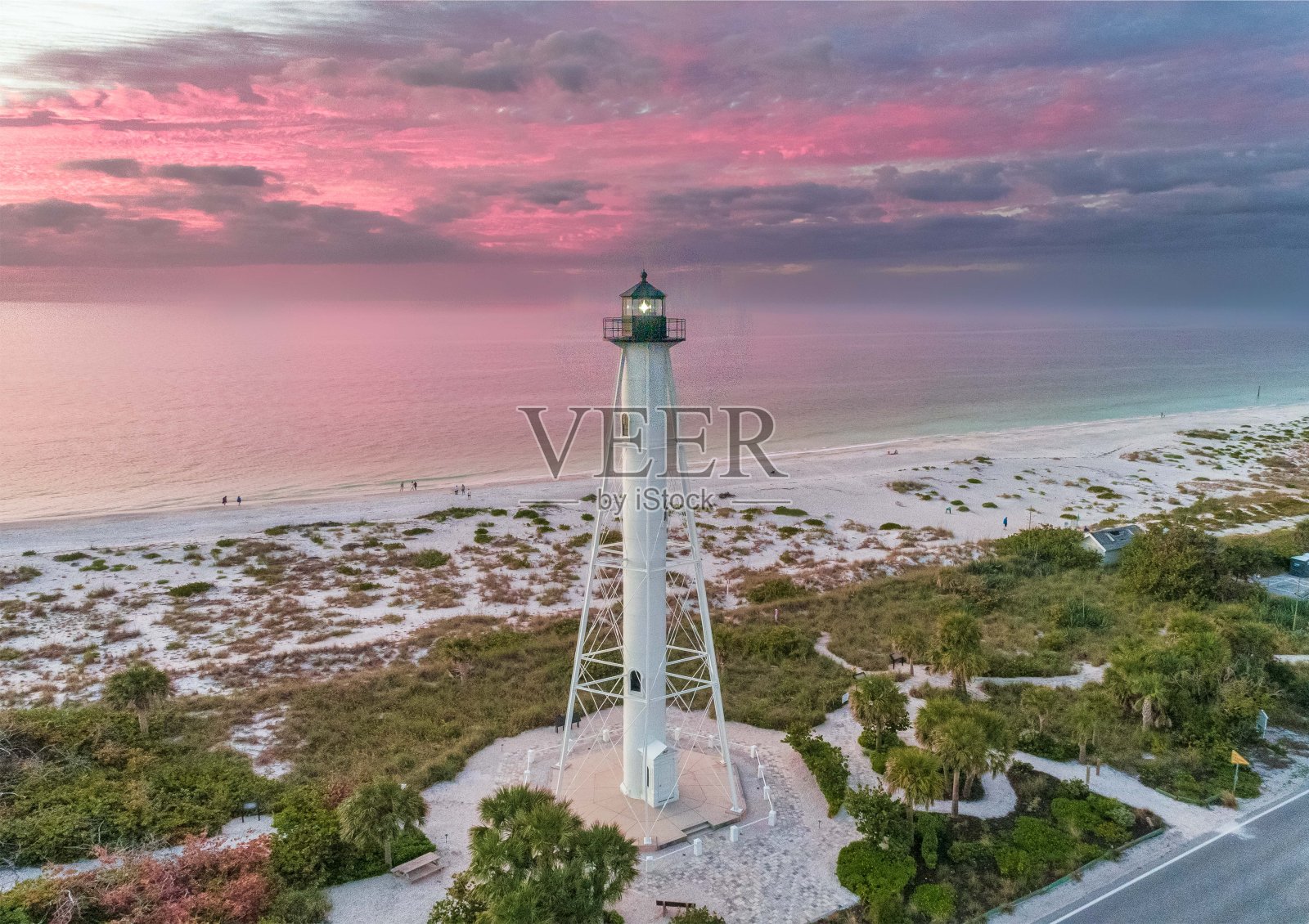 博卡格兰德后方灯塔灯笼房粉红色日落照片摄影图片