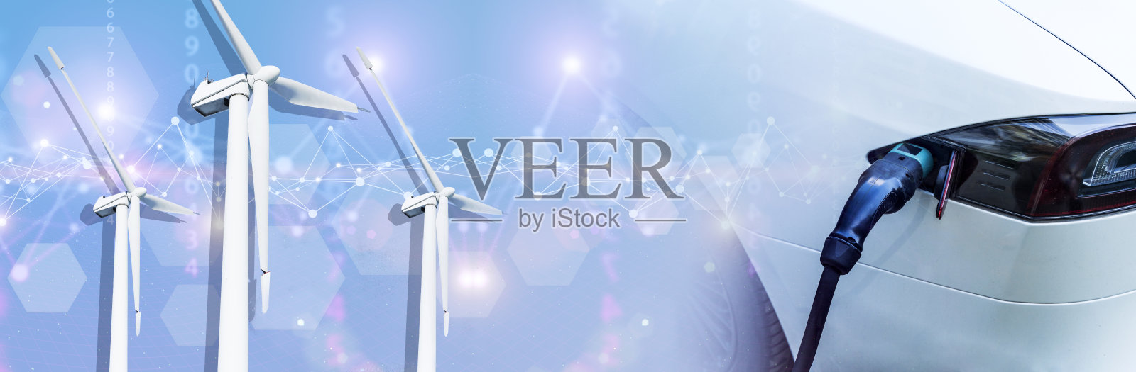 在车站给电动汽车充电。可再生能源，风车概念。绿色能源和可持续发展技术照片摄影图片