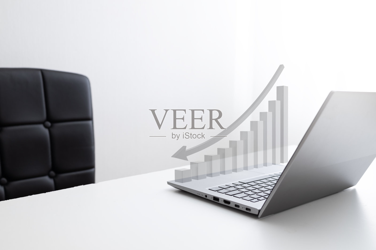 笔记本与回归图在白色背景照片摄影图片