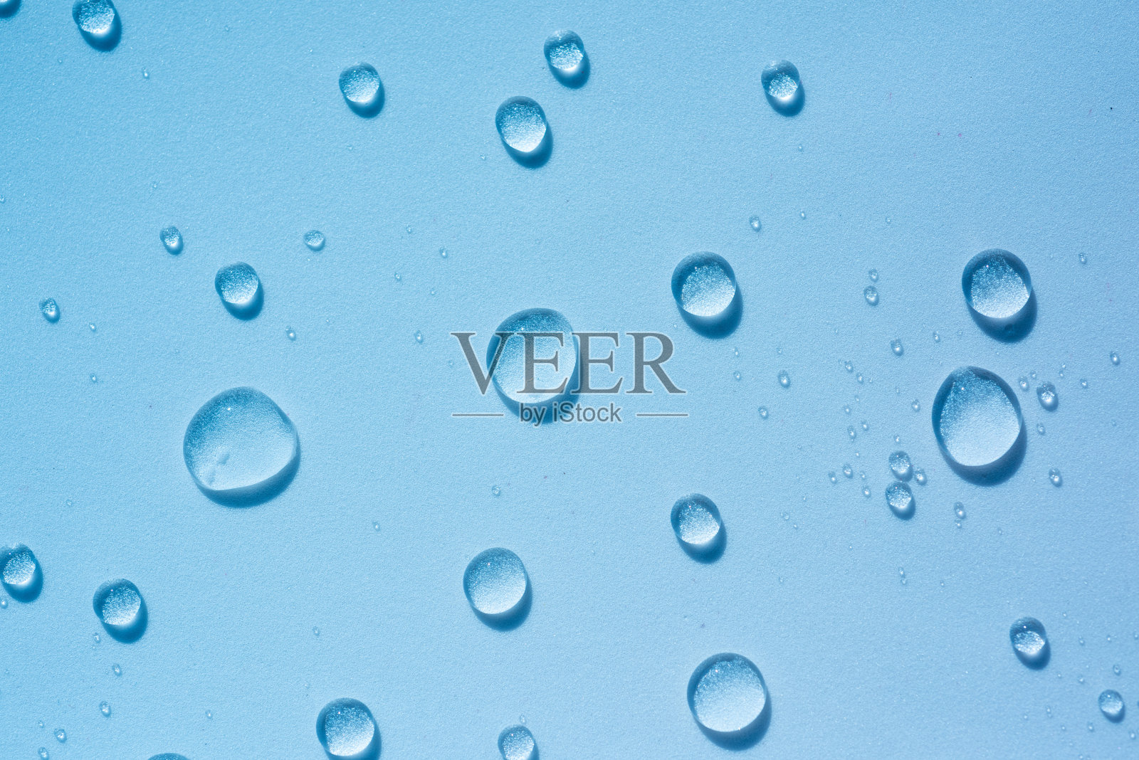 透明圆滴透明液体，透明质酸照片摄影图片