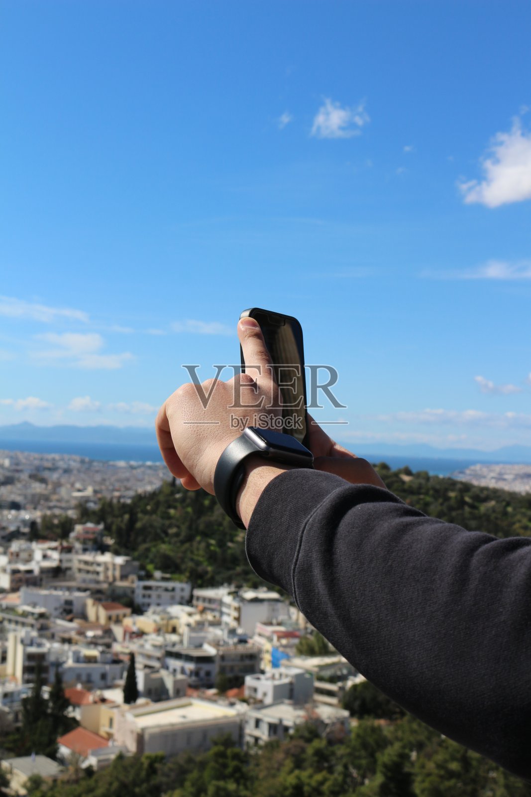 捕捉雅典:游客的手拍照照片摄影图片