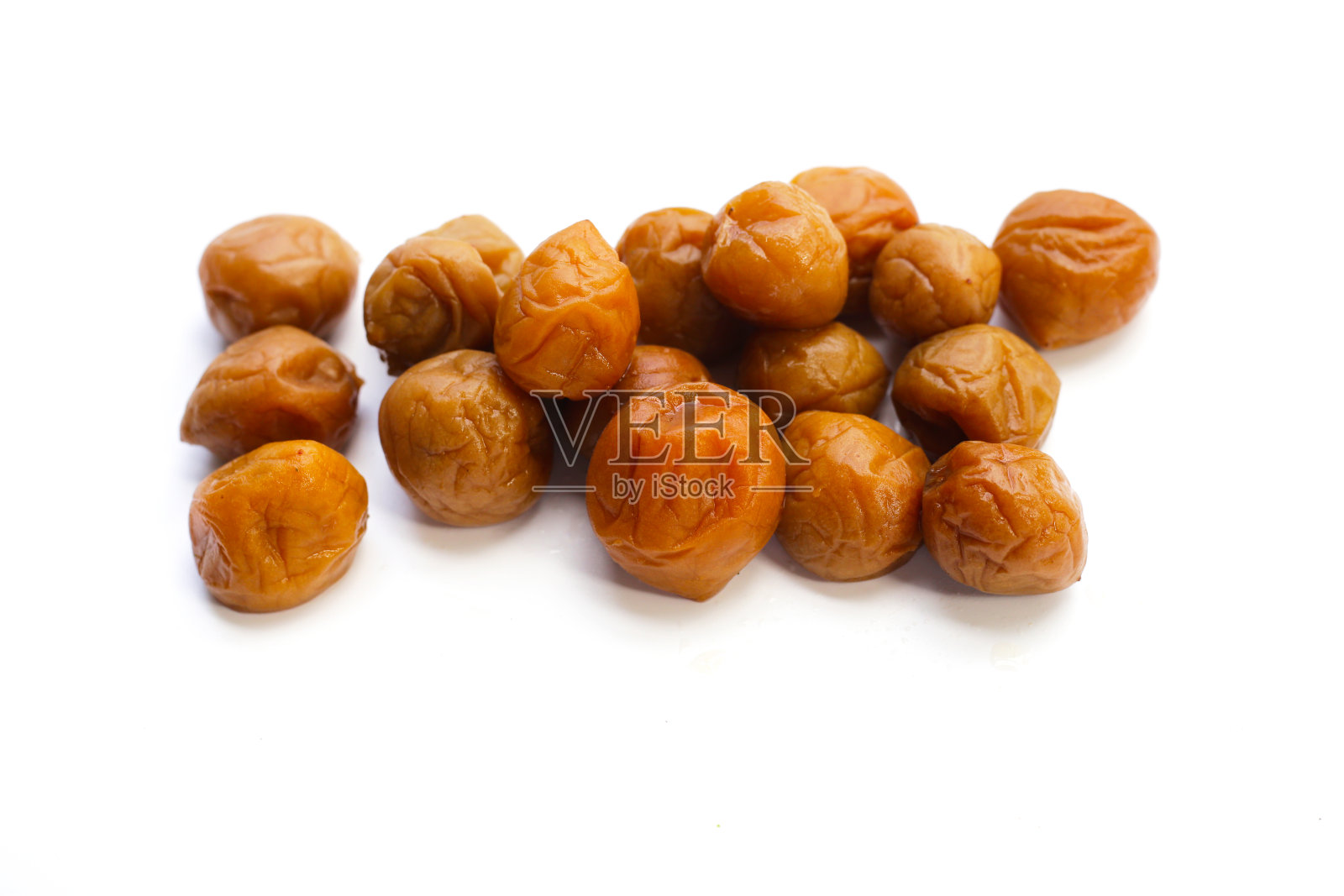 白底酸梅。照片摄影图片