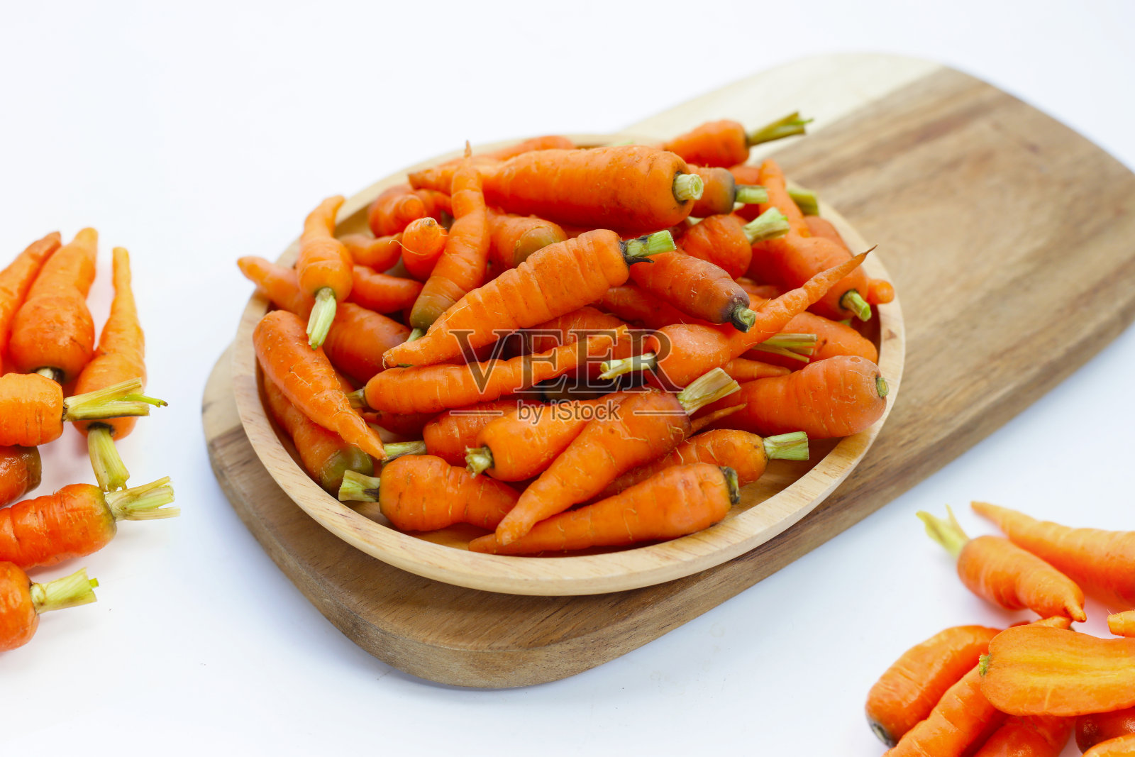 新鲜小胡萝卜，富含维生素A和胡萝卜素照片摄影图片