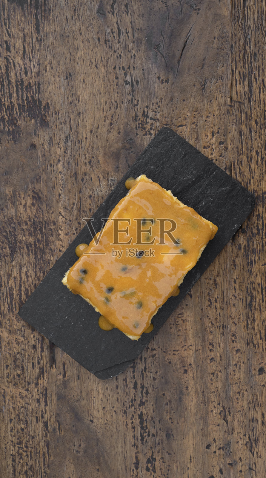 一片百香果芝士蛋糕照片摄影图片