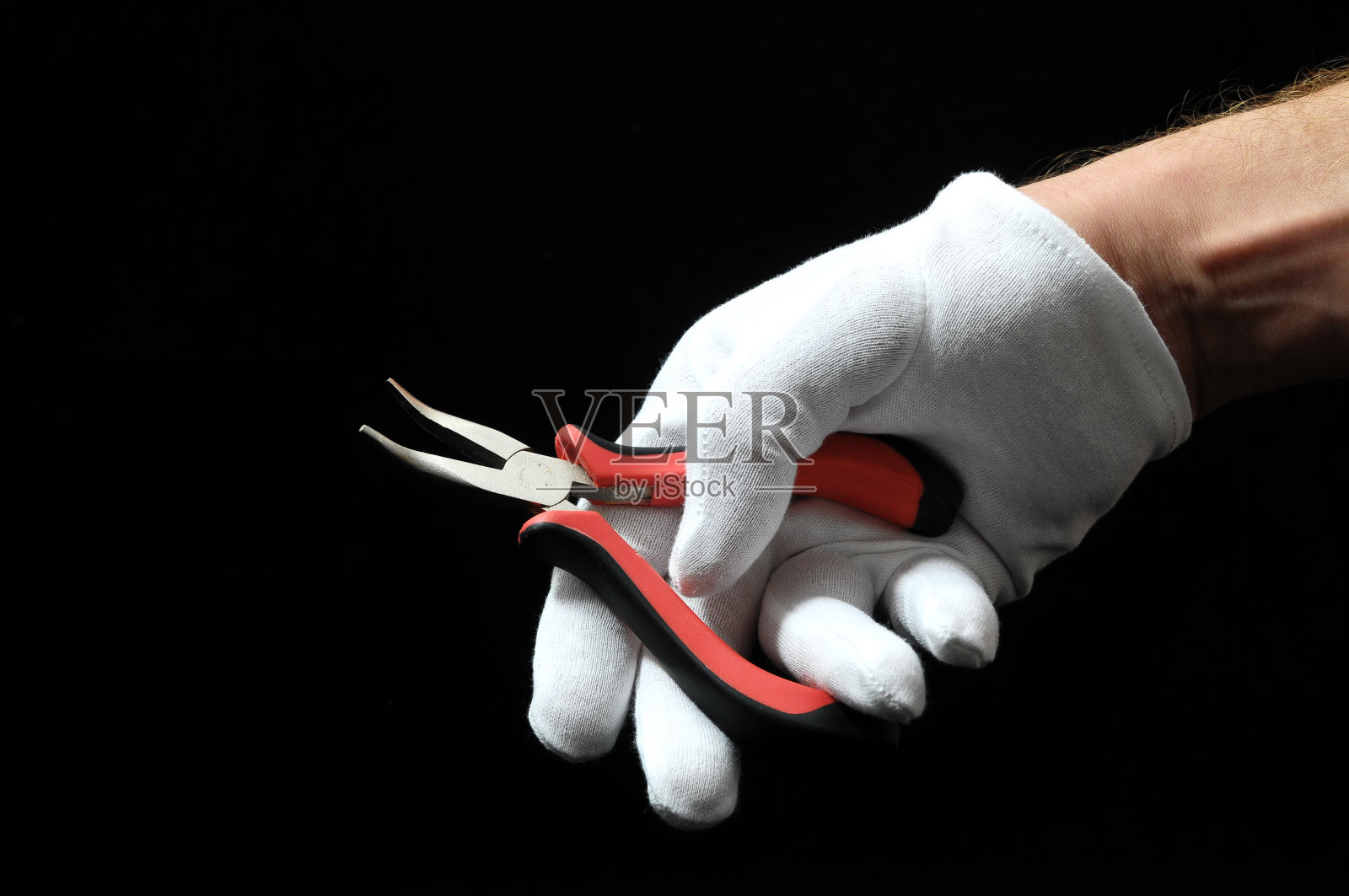 钳子和手照片摄影图片