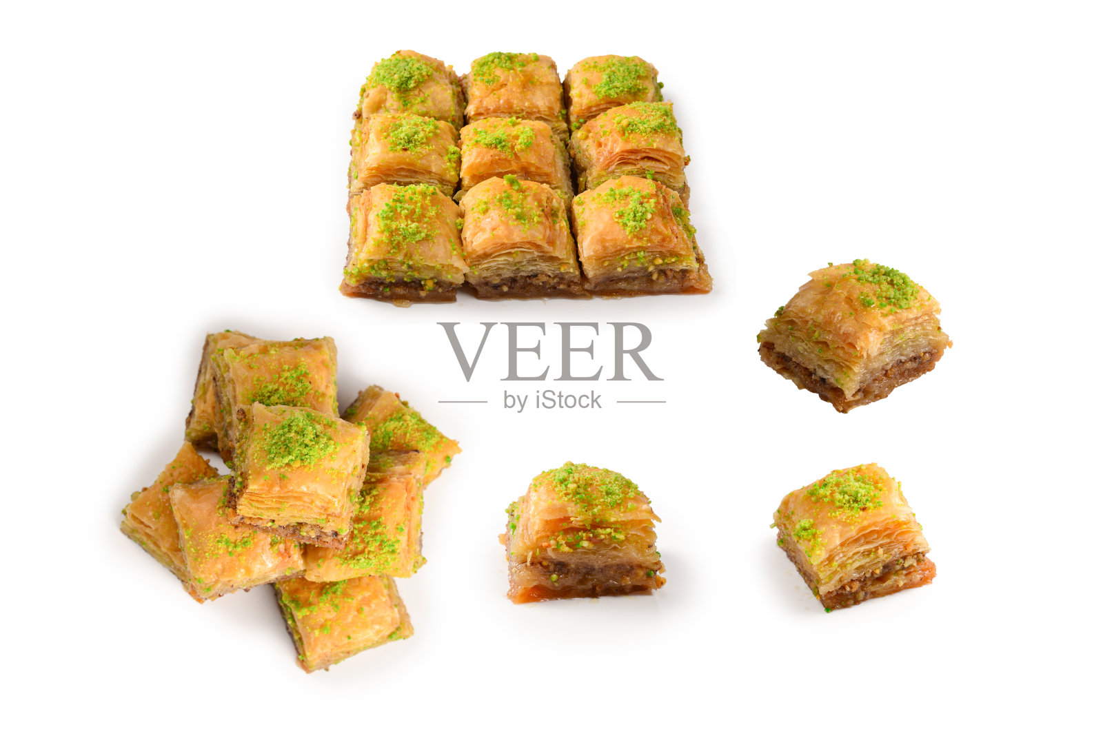 白底开心果果仁。甜点。照片摄影图片