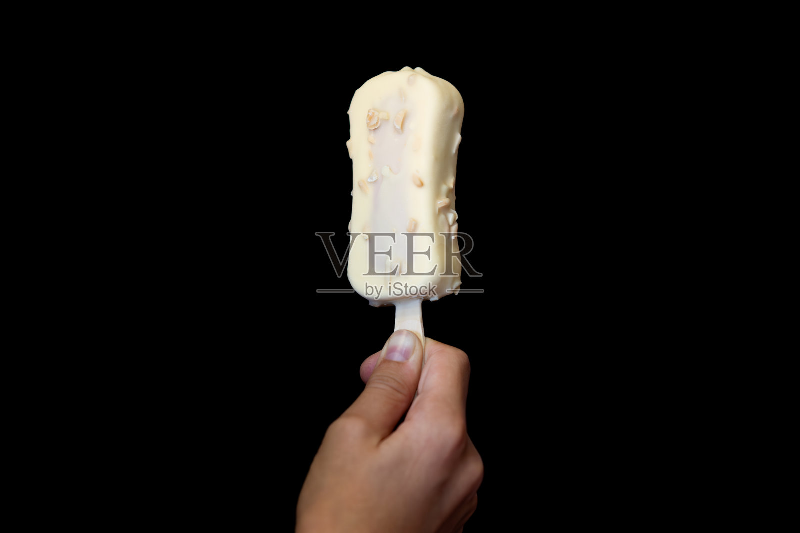 儿童手里拿着巧克力冰棒，度假，冰淇淋，特写照片摄影图片