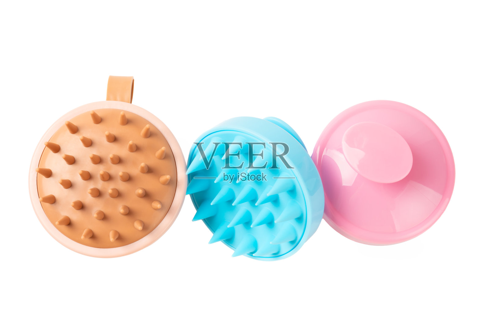 头皮按摩刷孤立在白色背景。用于头发生长刺激刷。头发按摩。刺激刷。护发，放松头部。照片摄影图片