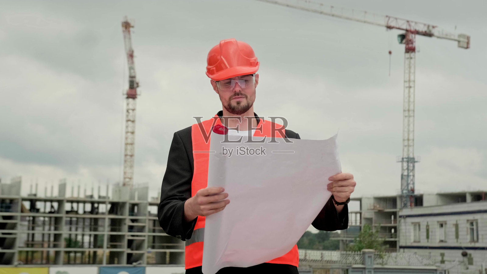 在施工现场有大计划的主管照片摄影图片