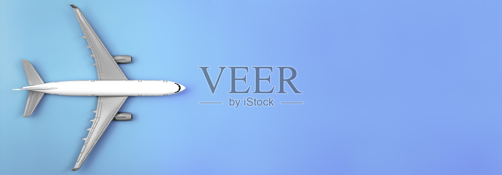 飞机以蓝色为背景，平面布局，旅行概念。照片摄影图片