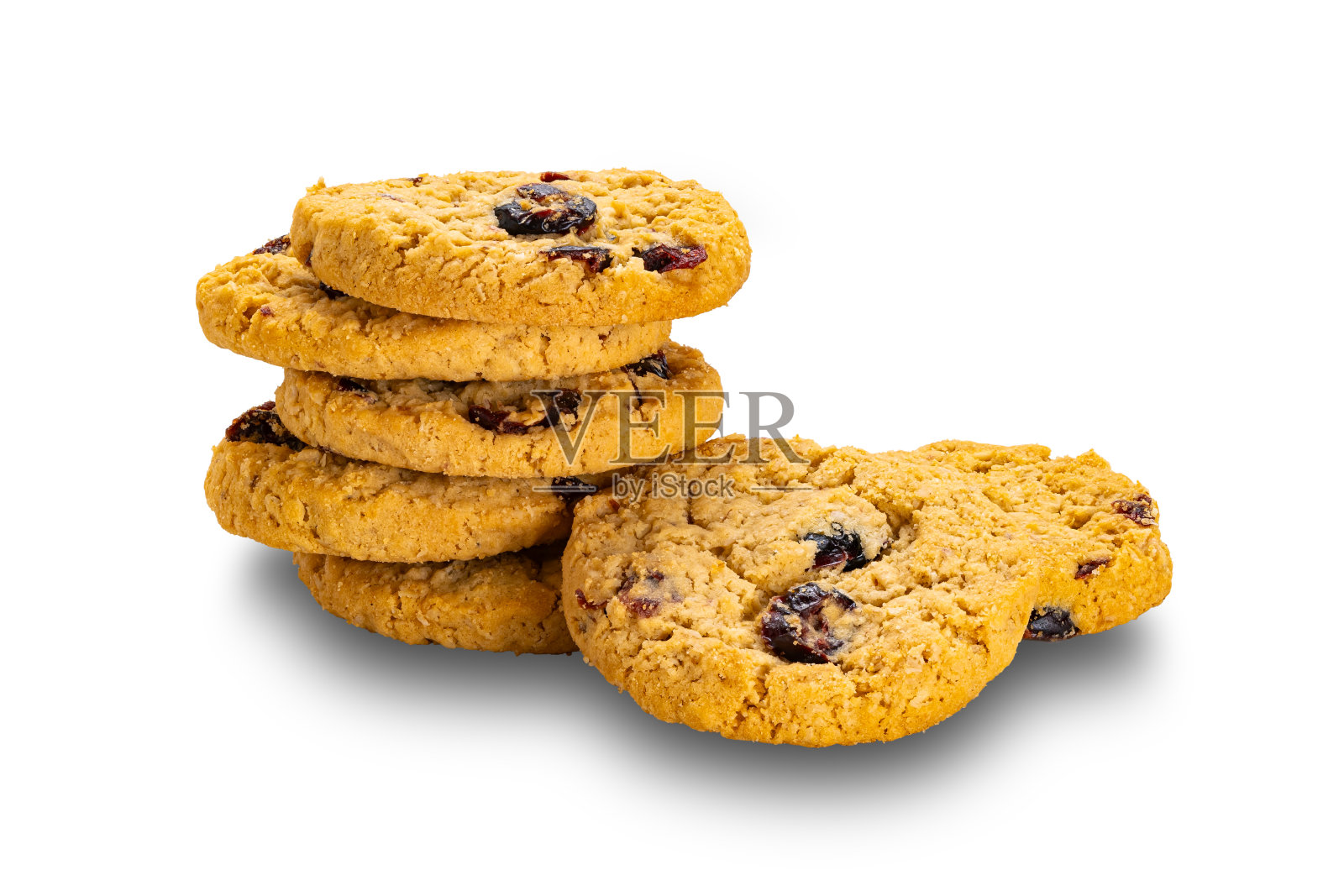 一堆脆燕麦片和蔓越莓饼干。照片摄影图片