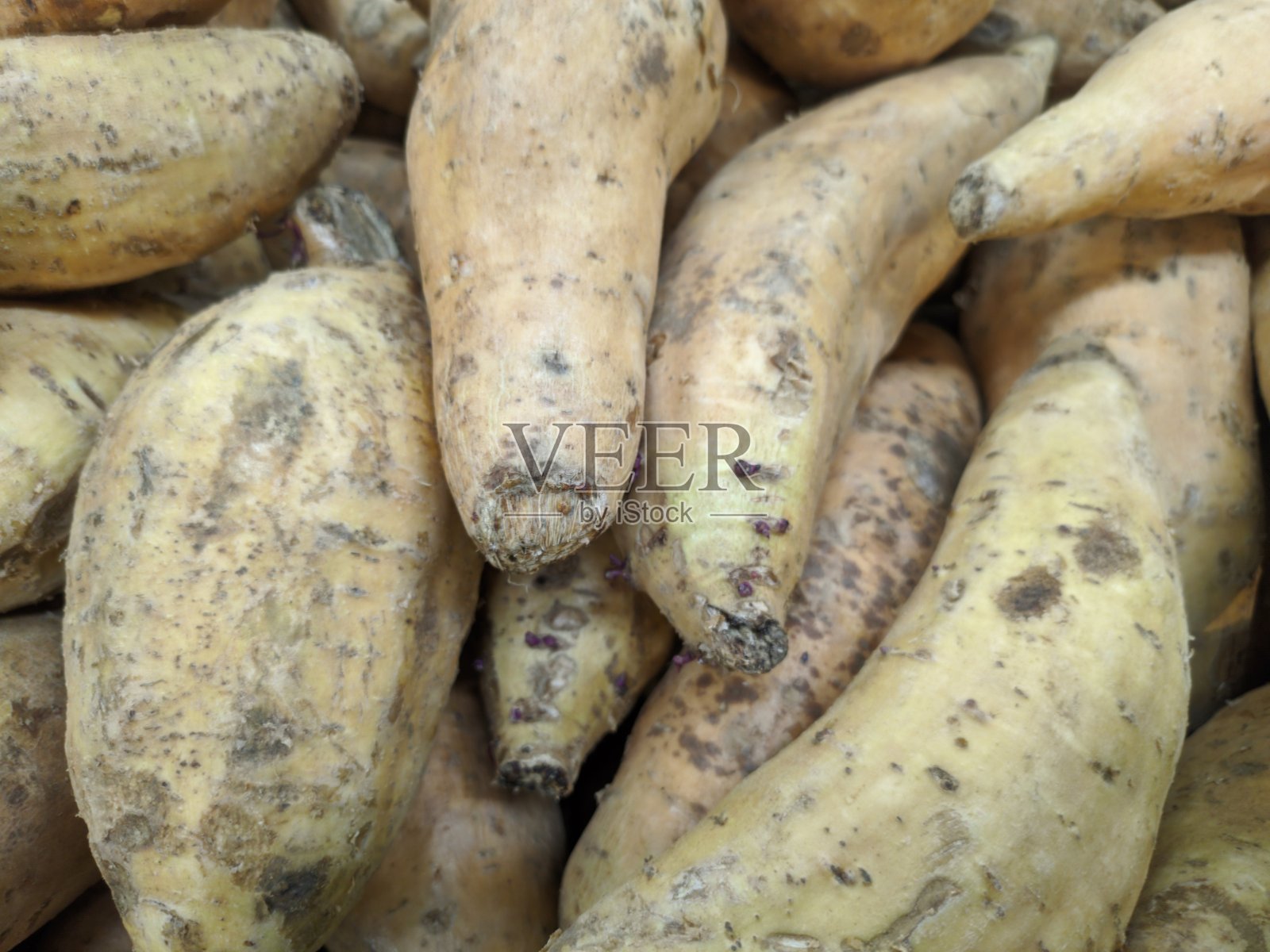 市场上的红薯照片摄影图片