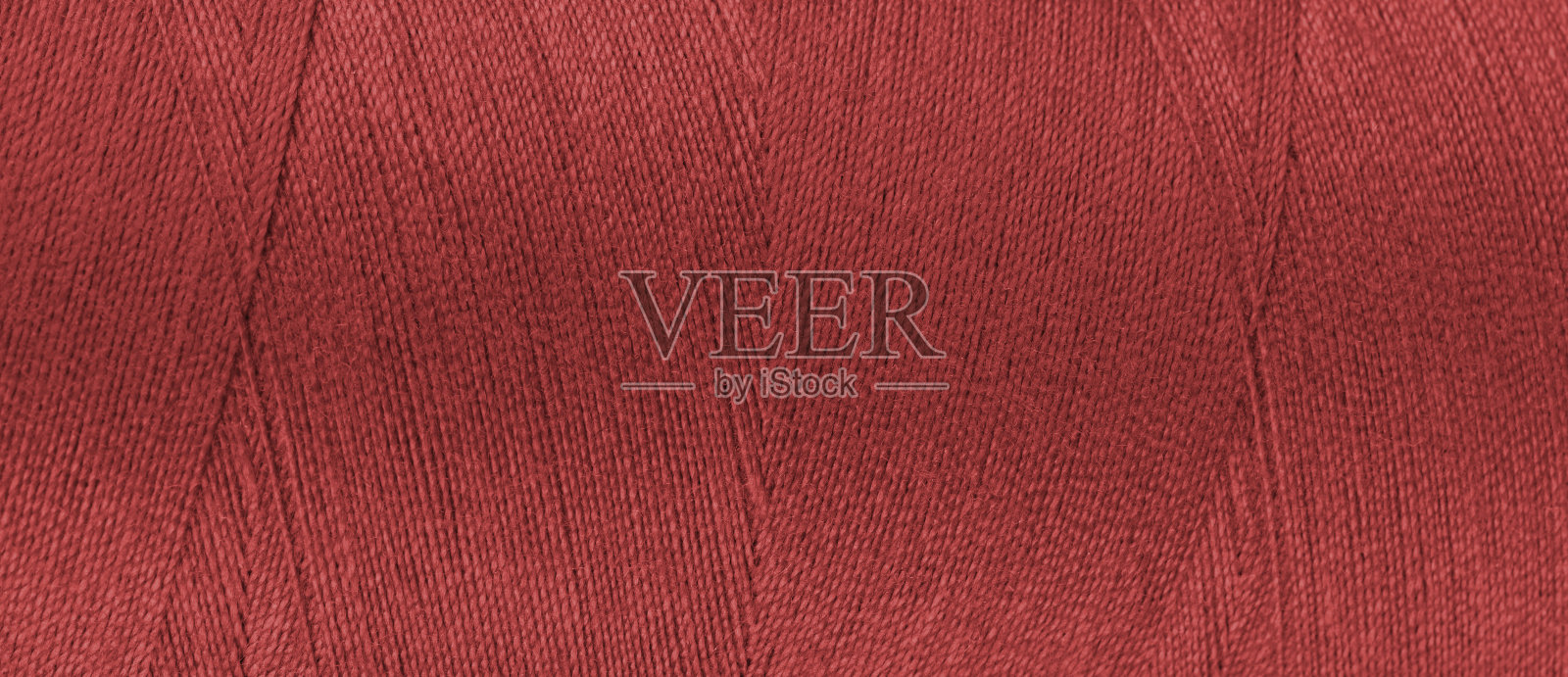 纹理的红色线在线轴接近，宏观。宽横幅、页眉照片摄影图片