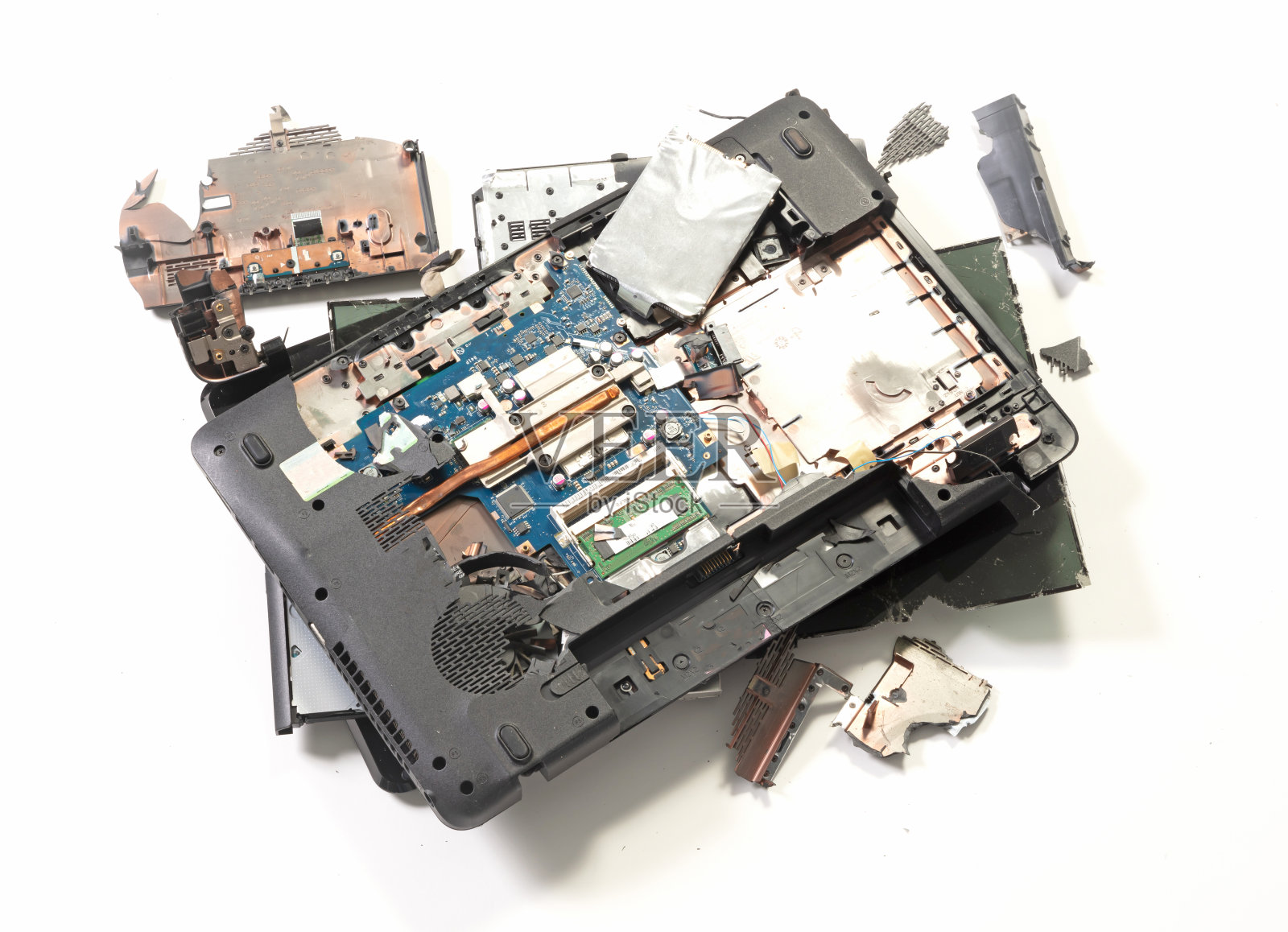 破旧的笔记本电脑被孤立在白色背景上照片摄影图片