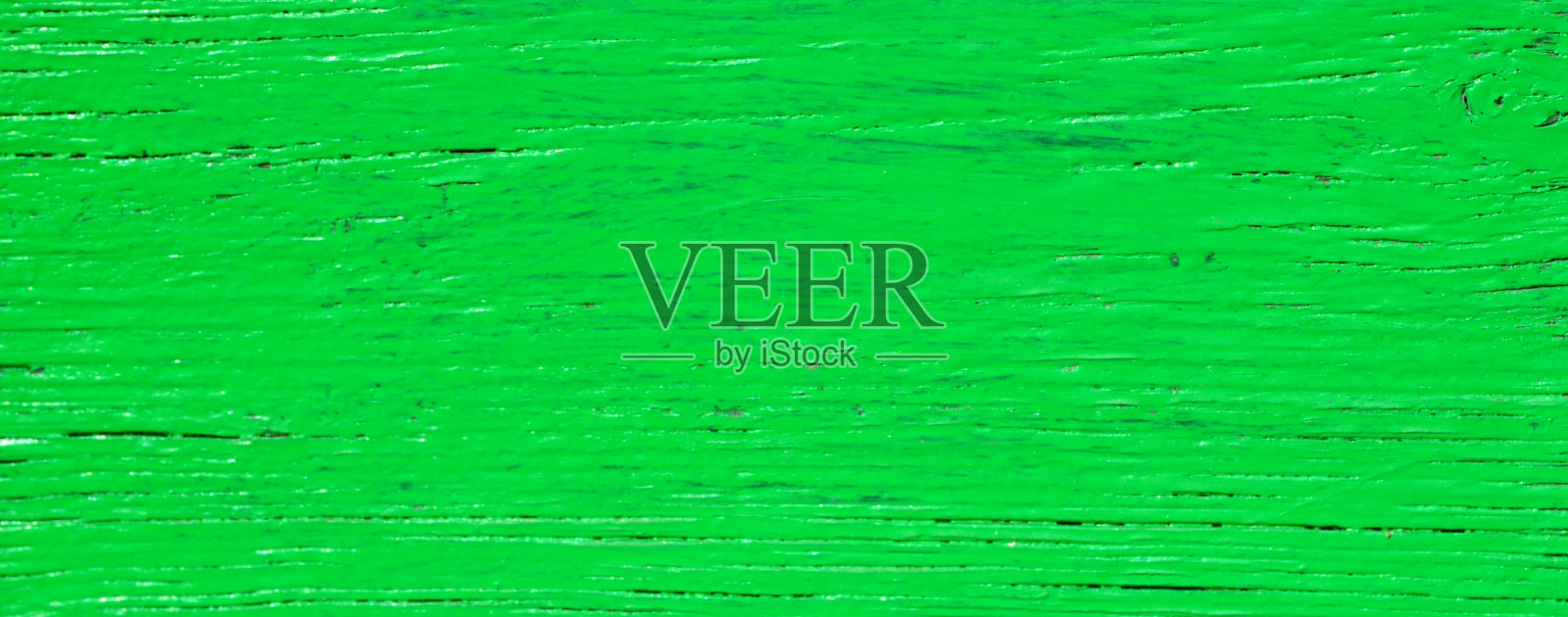 绿漆旧木背景纹理的设计。照片摄影图片