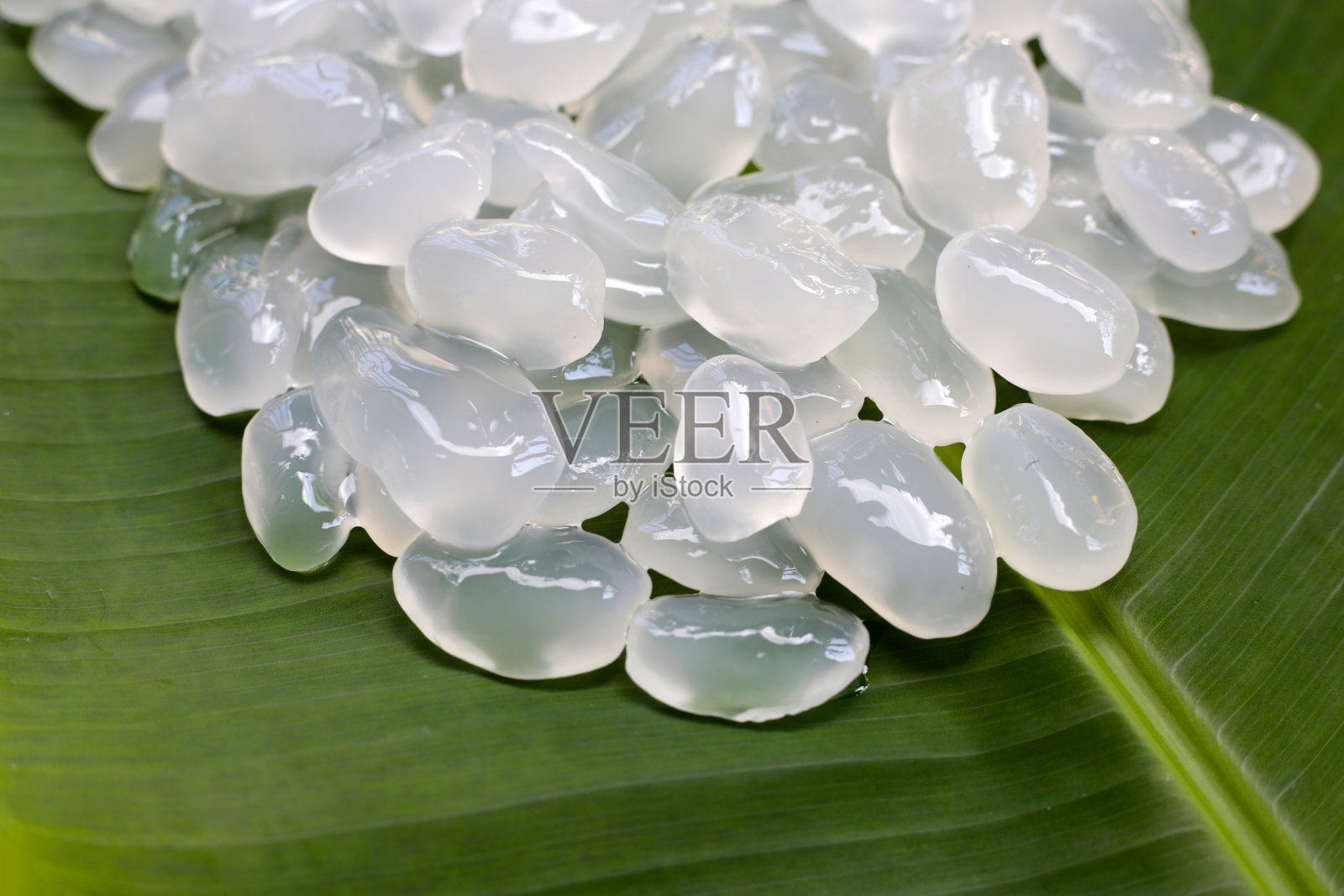 糖棕榈籽在糖浆照片摄影图片