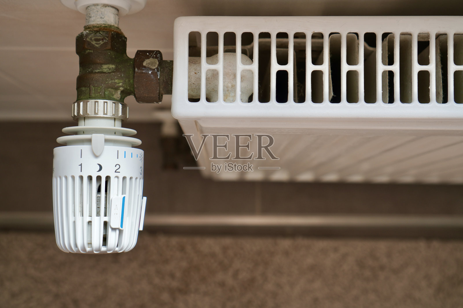 位于二级加热位置的散热器旋钮照片摄影图片