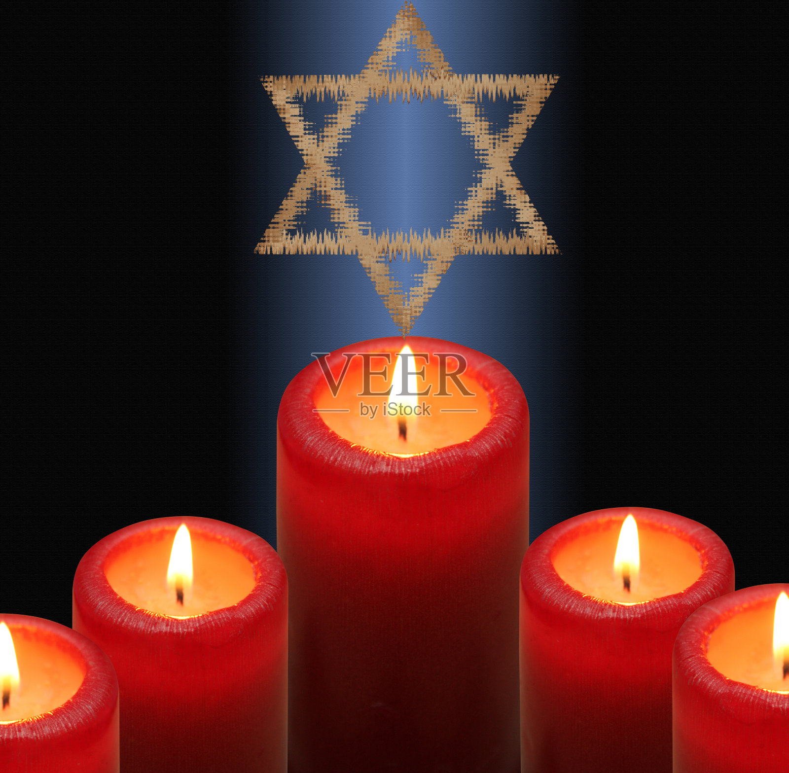 光明节烛台点燃的蜡烛，背景是大卫之星照片摄影图片