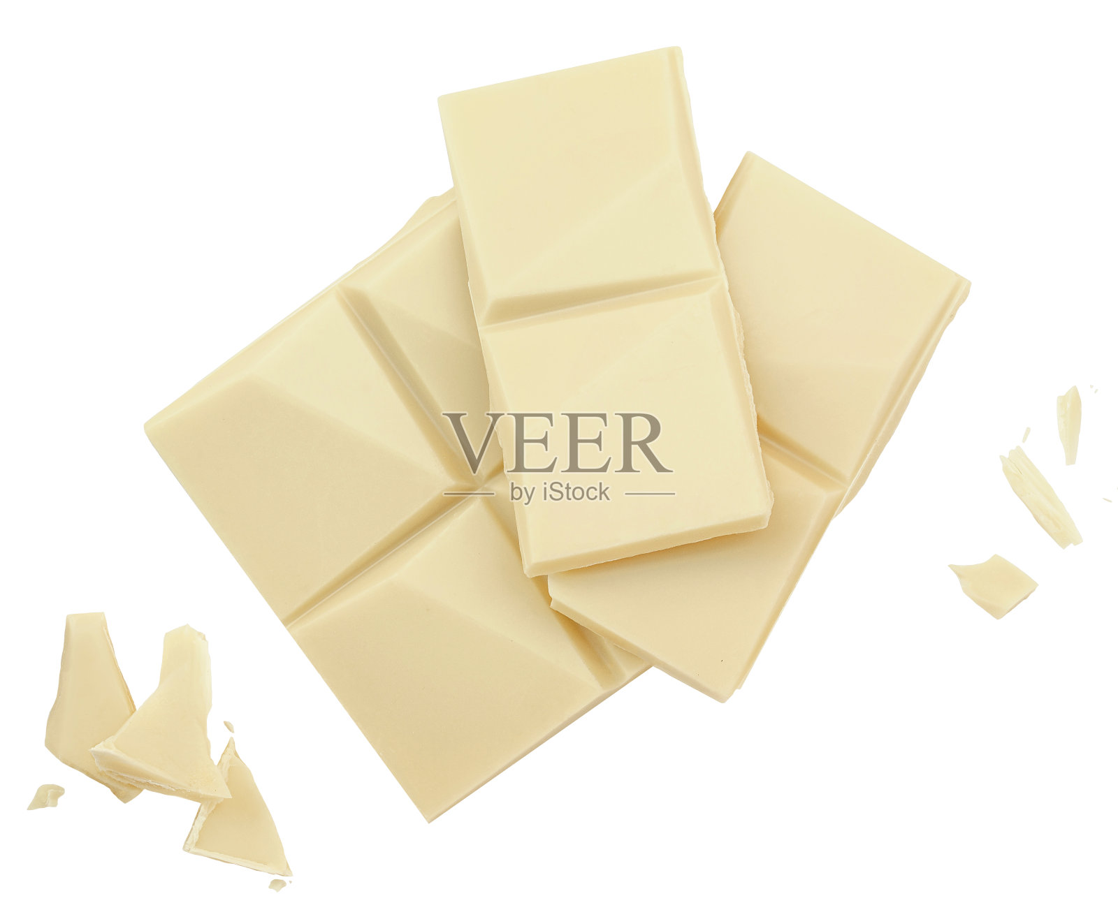 白色背景上的白巧克力块。牛奶巧克力与面包屑俯视图。平的。包装设计要素照片摄影图片