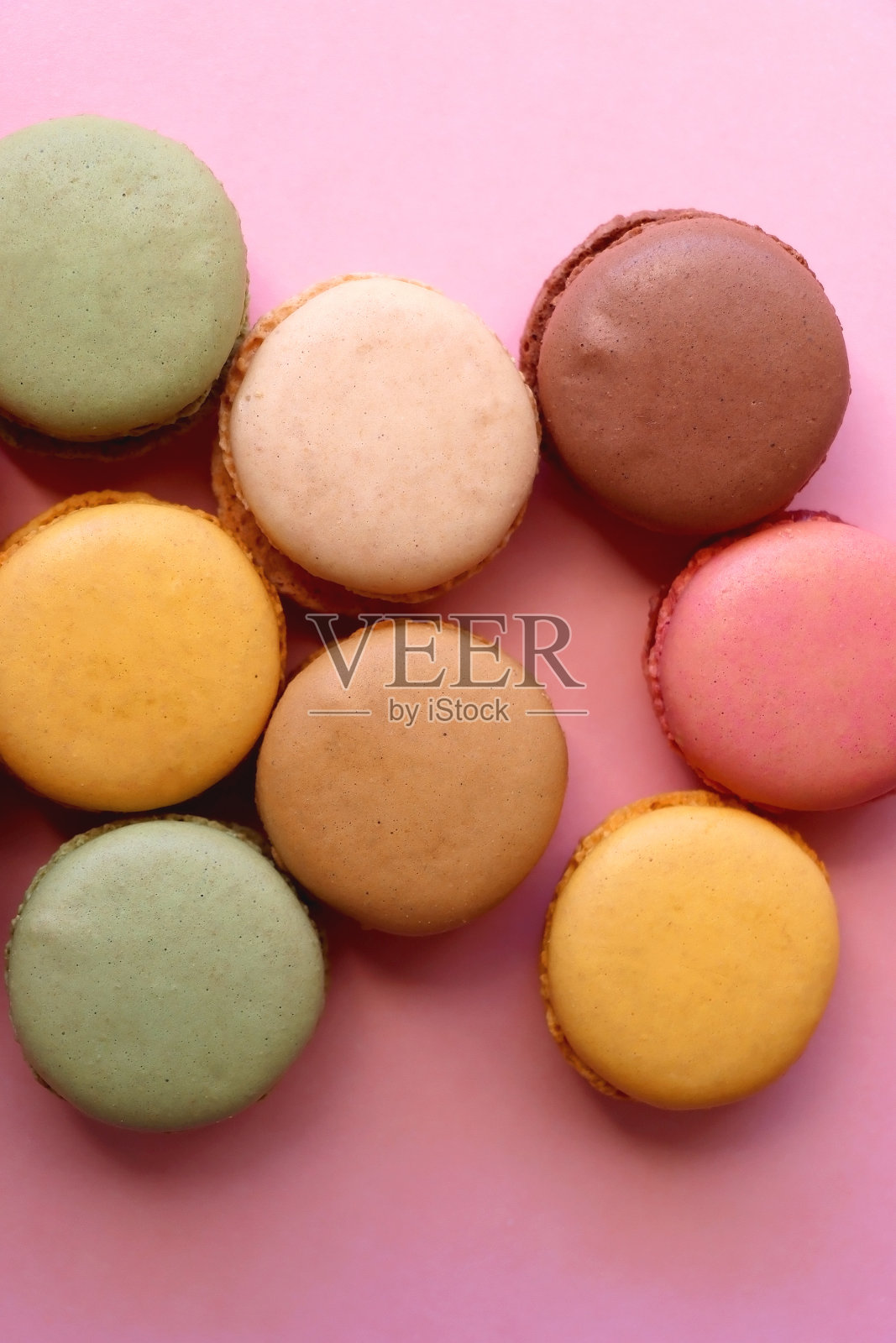 粉红色背景的马卡龙照片摄影图片
