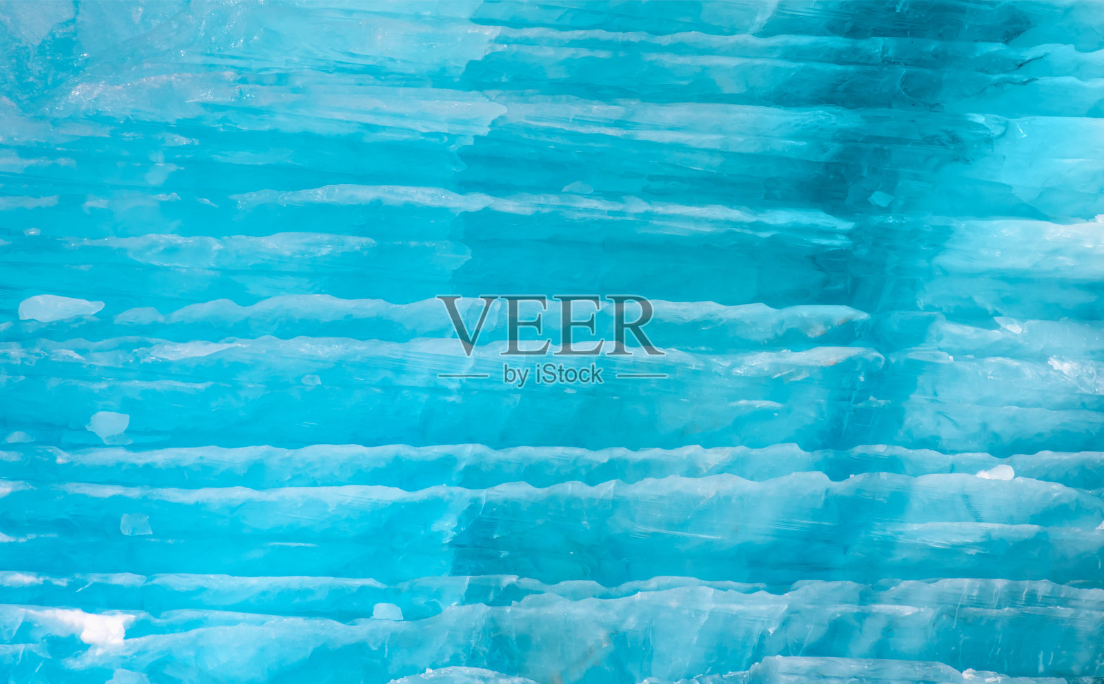 冰川的纹理和蓝色冰川的一部分-库鲁苏克附近的克努德拉斯穆森冰川-格陵兰岛，东格陵兰岛照片摄影图片